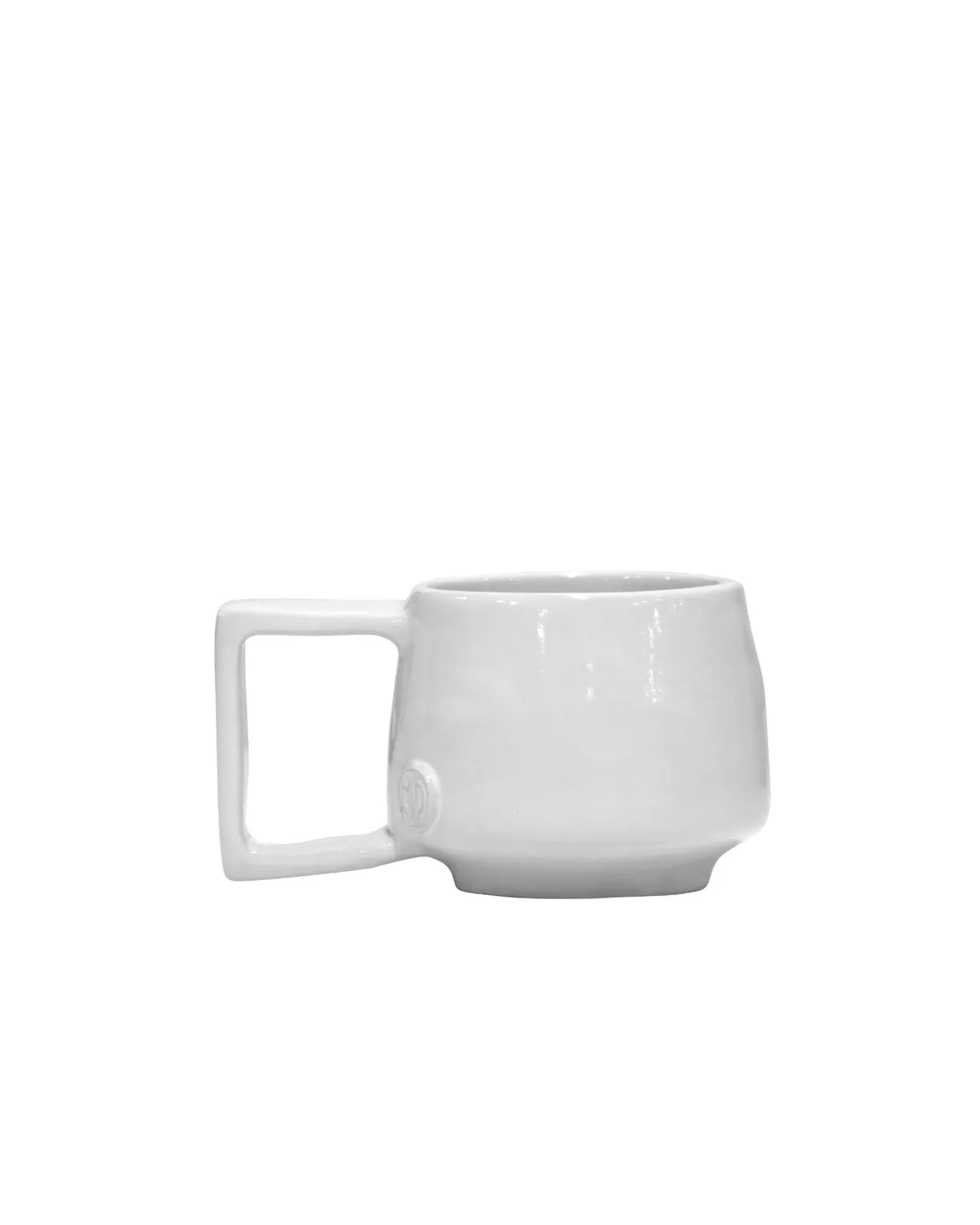 The Montes Doggett 4754 Mug No. 754 is a white, high-fired ceramic mug with a round body and unique square handle, shown on a plain white background.