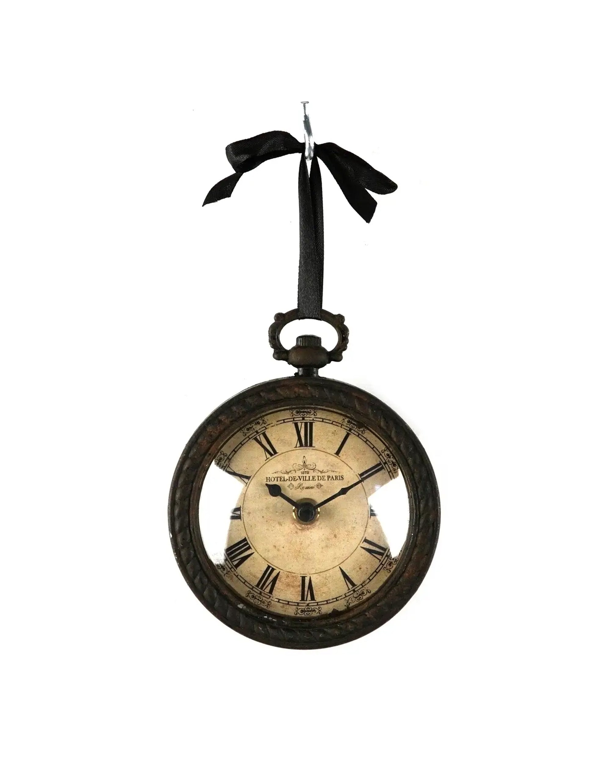 The Zentique Myrtle Iron Clock features Roman numerals, a vintage-inspired worn face, and a decorative edge—an exquisite wall decor piece reminiscent of antique pocket watches. The dial reads "Hotel de Ville de Paris.