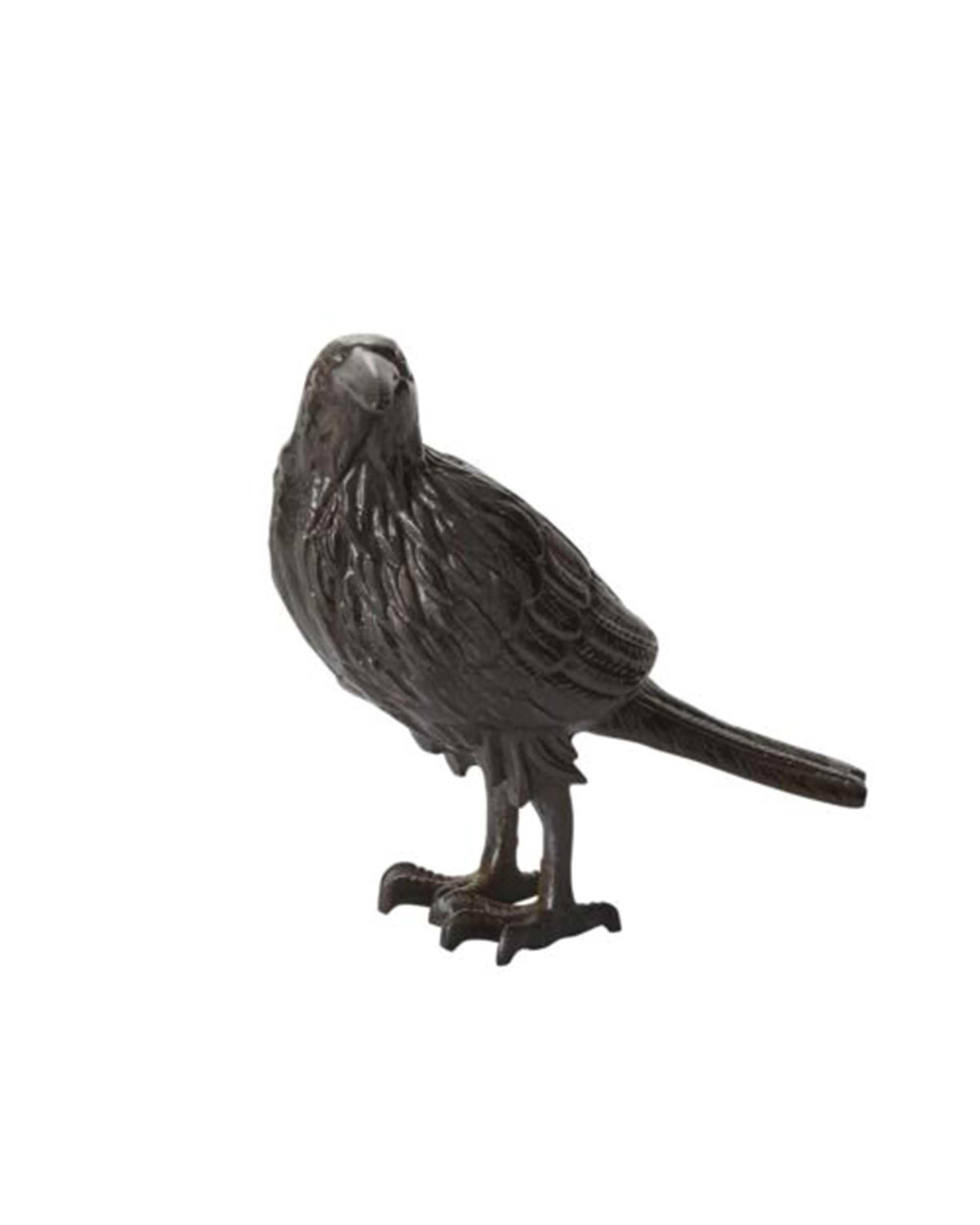 The Accent Decor Nevermore Figurine is a small, dark bronze raven with detailed feathers and a long tail, standing upright to add a subtle haunted touch against a plain white background.