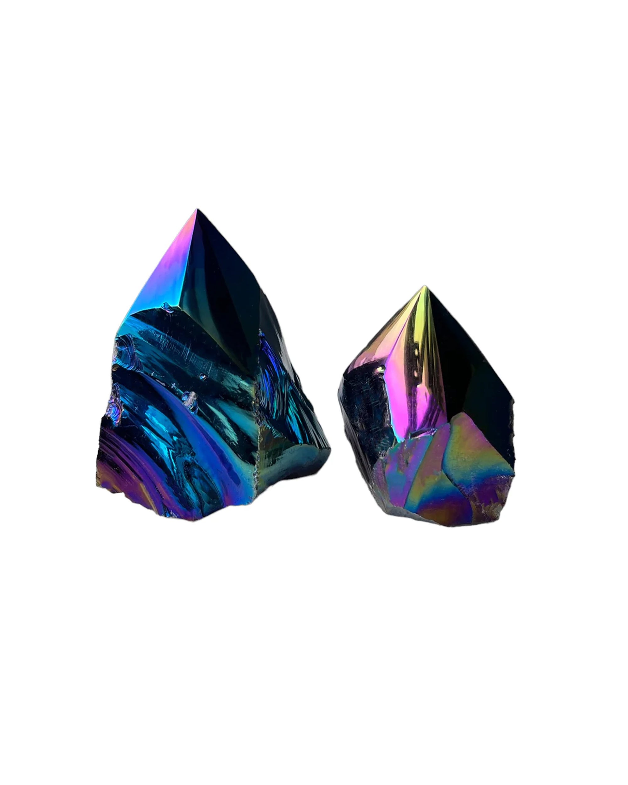 The Blue Ocean Traders Aura Black Obsidian Point features two striking crystals with pointed tips, showcasing a sleek black finish on a white background—a sculptural addition to any collection.