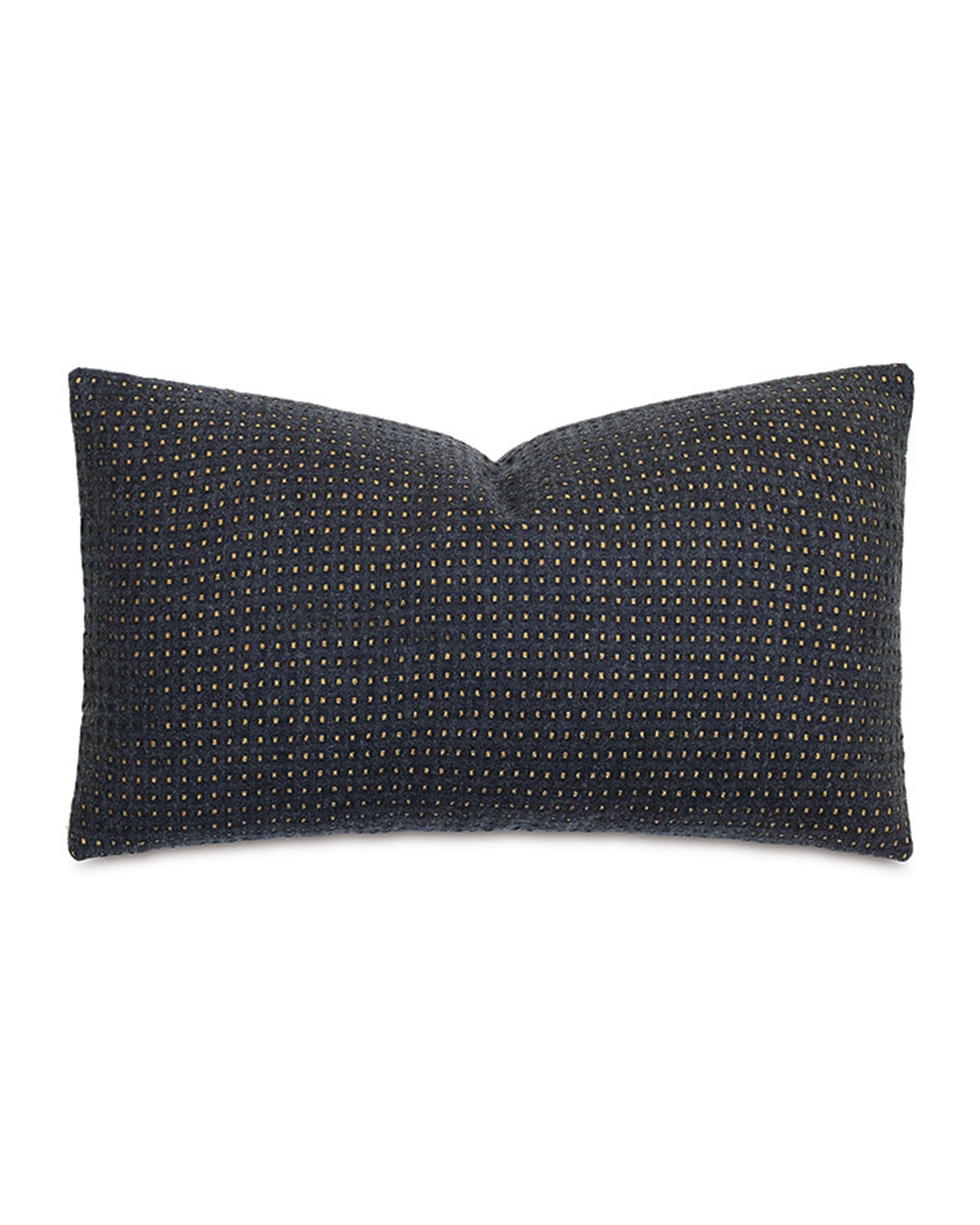 The OCTAVIUS WOOL pillow by Eastern Accents is a 15x26 rectangular charcoal decorative pillow with a textured surface and a grid of small, evenly spaced gold dots.