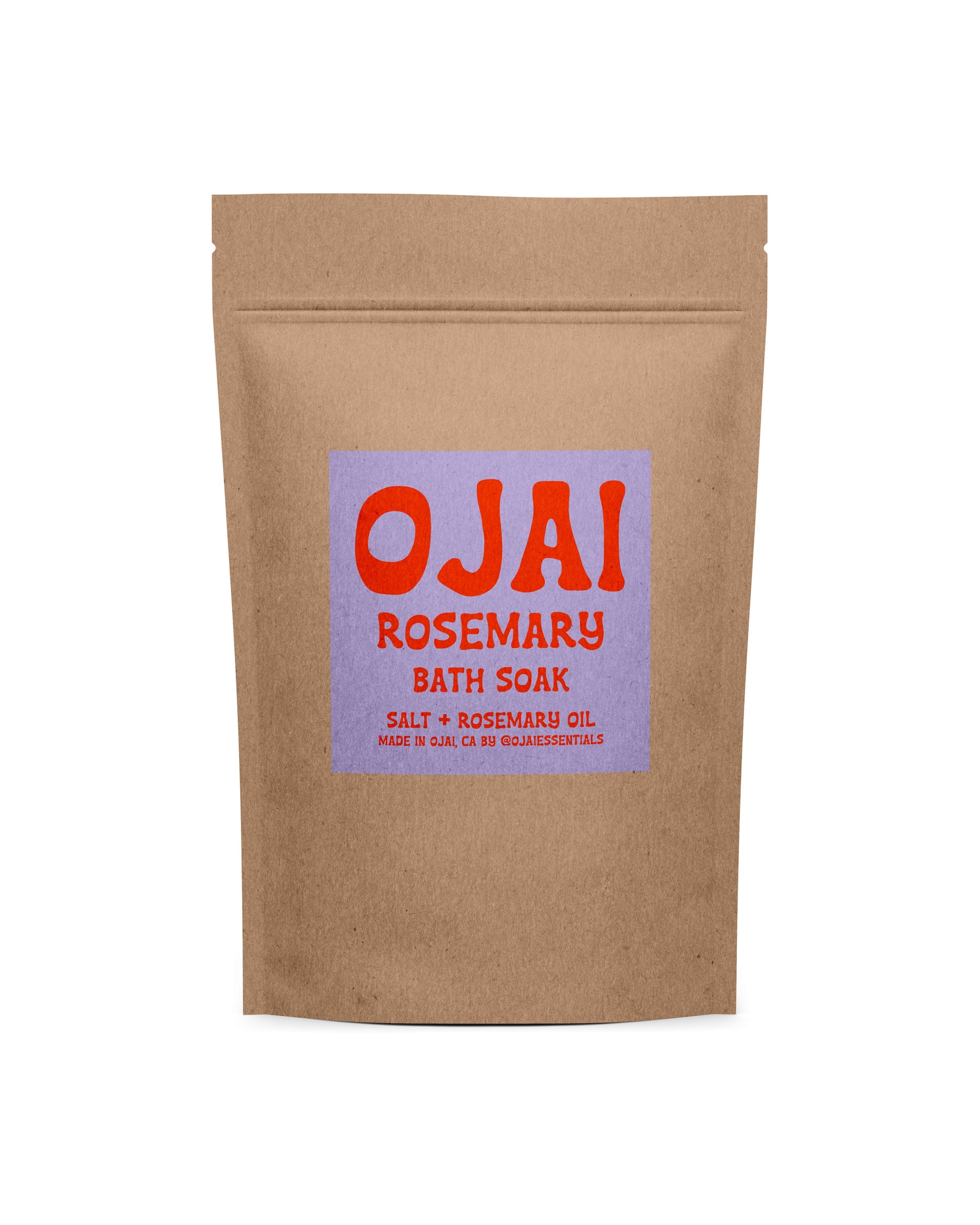 A brown pouch with a purple label reads "Ojai Rosemary Bath Salts" by Faire—salt and rosemary oil blend for relaxing self-care soaks, crafted in Ojai, CA. Bold red and orange lettering adds a soothing touch.