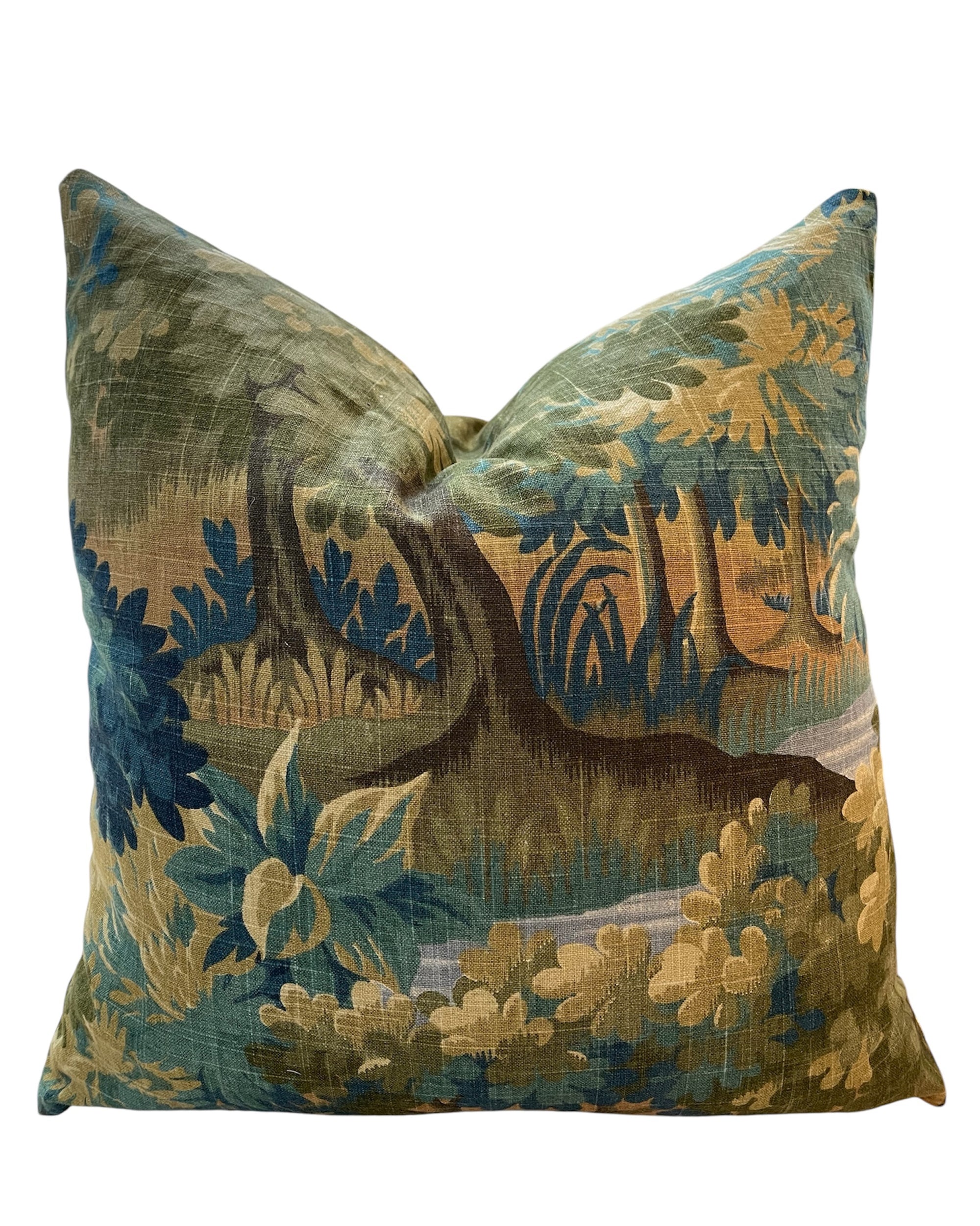 The Opal Landscape 20x20 Pillow by Dahlia & Grace Pillows features a tapestry-style wooded forest design in green, blue, and brown cotton. This decorative pillow is crafted in North Carolina.