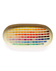 Oval enamel tray by Faire with a rainbow grid pattern, colorful modern accent for home decor.