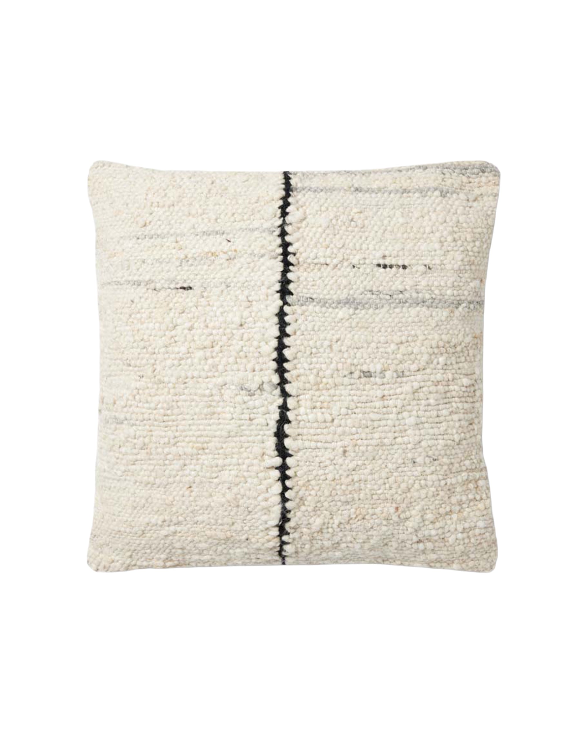 The Carla Ivory Pillow 22x22 by Loloi Rugs features textured cream fabric, handwoven from wool, polyester, and cotton with a black vertical line, subtle gray accents, antique bronze zipper, and a white background.