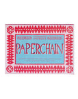 A rectangular box labeled "Faire Paperchain" features a red and blue decorative border and white text, promoting biodegradable patterned paper strips for making a decorative paperchain.