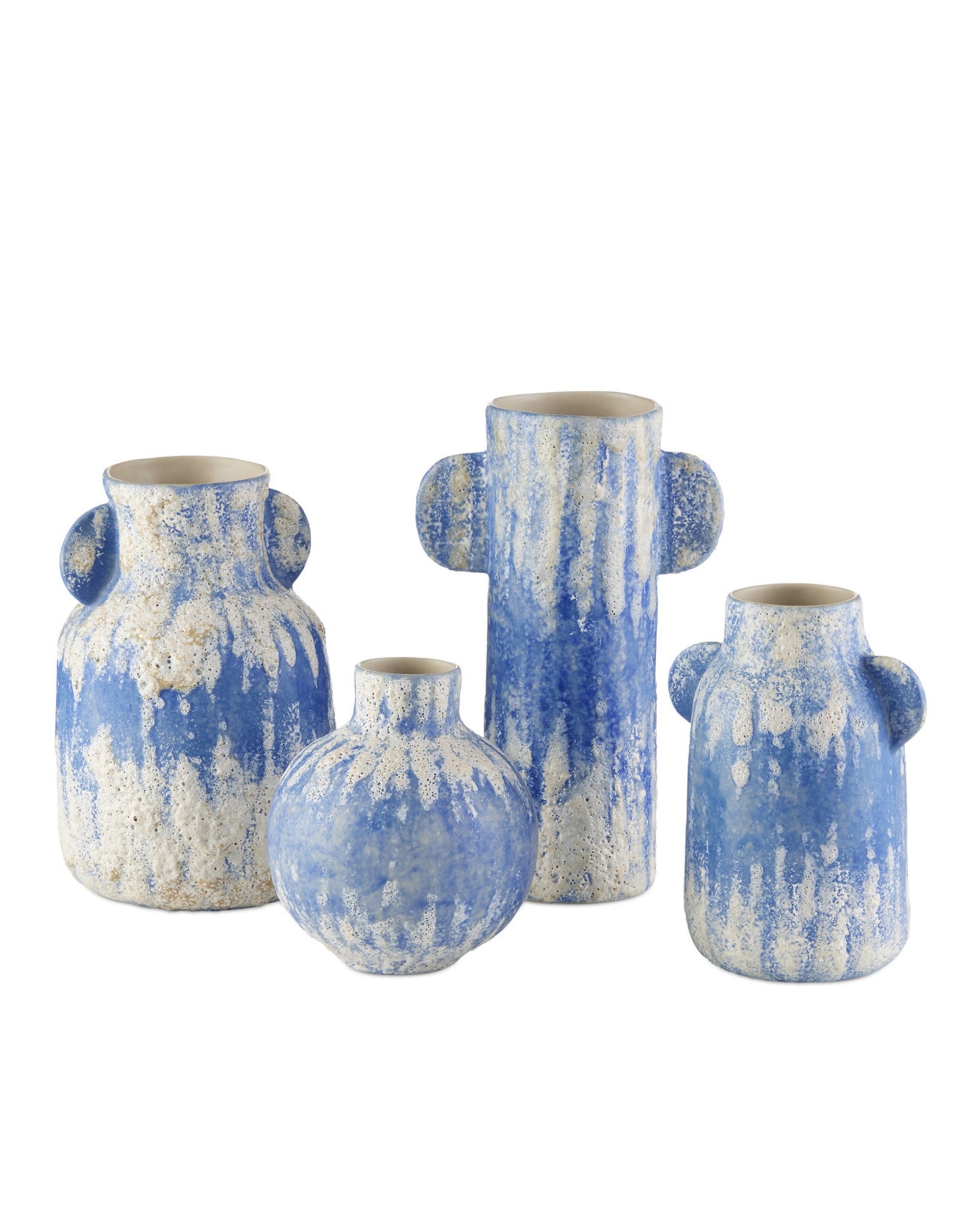 The Paros Vase set by Currey & Company, Inc. features four unique blue ceramic vases with textured blue and white glaze, each with distinctive shapes and handles—perfect for adding Mediterranean charm to any décor.
