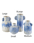 Four Paros Vases by Currey & Company, Inc.—blue and white textured ceramics in Large, Medium, Small, and XLarge—are arranged side by side on a white background for a striking Mediterranean display.