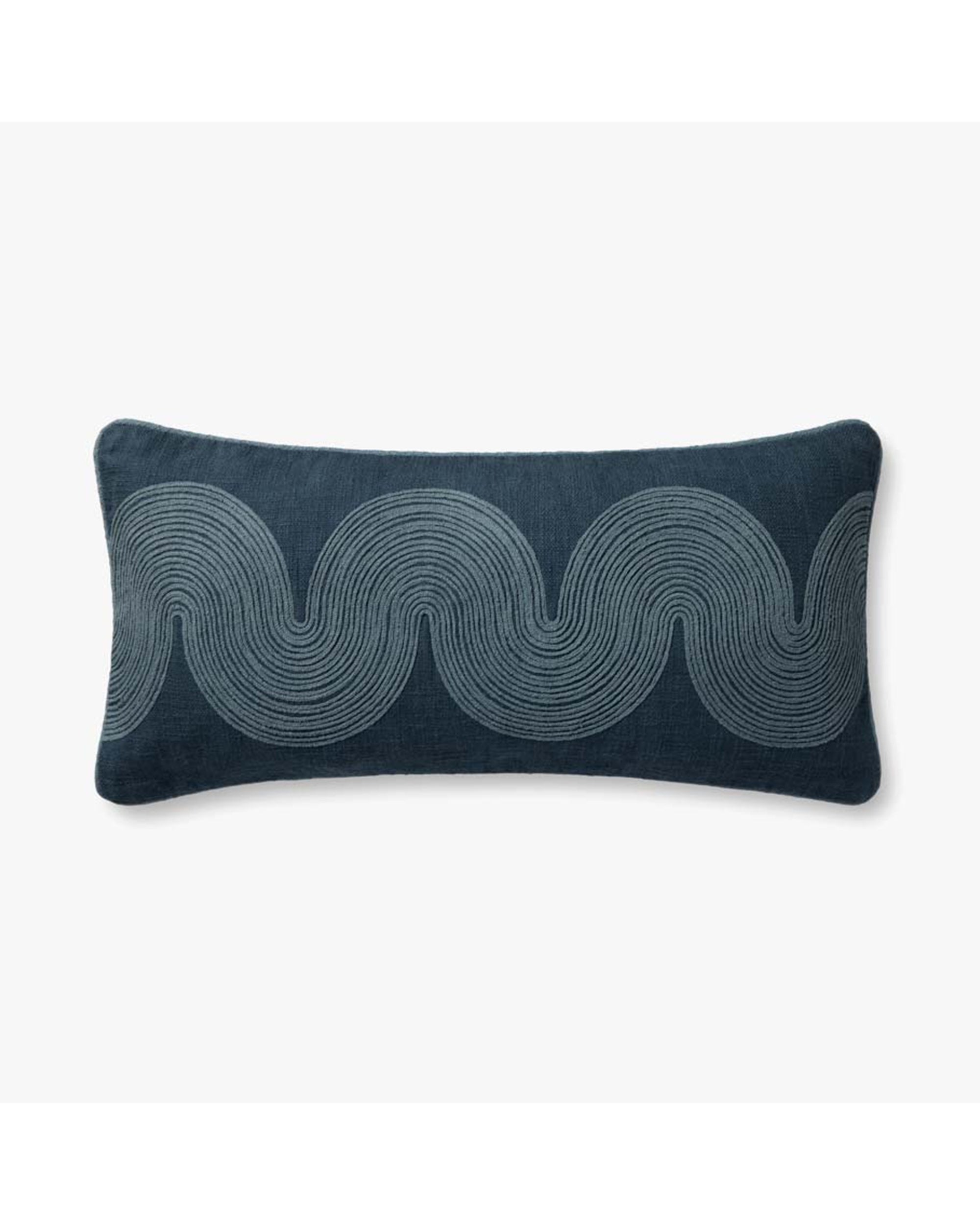 The Loloi Rugs PBR0004 Navy Pillow is a rectangular dark blue cotton pillow with an embroidered light blue wavy line pattern on the front.