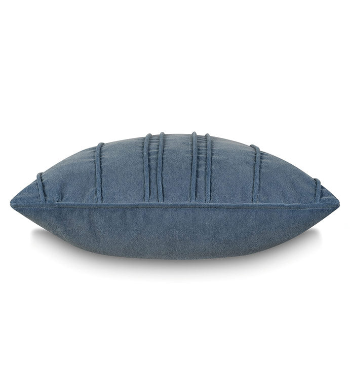 Blue velvet pillow with vertical stitching, side view. Eastern Accents Penelope denim blue pillow.