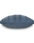 Blue velvet pillow with vertical stitching, side view. Eastern Accents Penelope denim blue pillow.