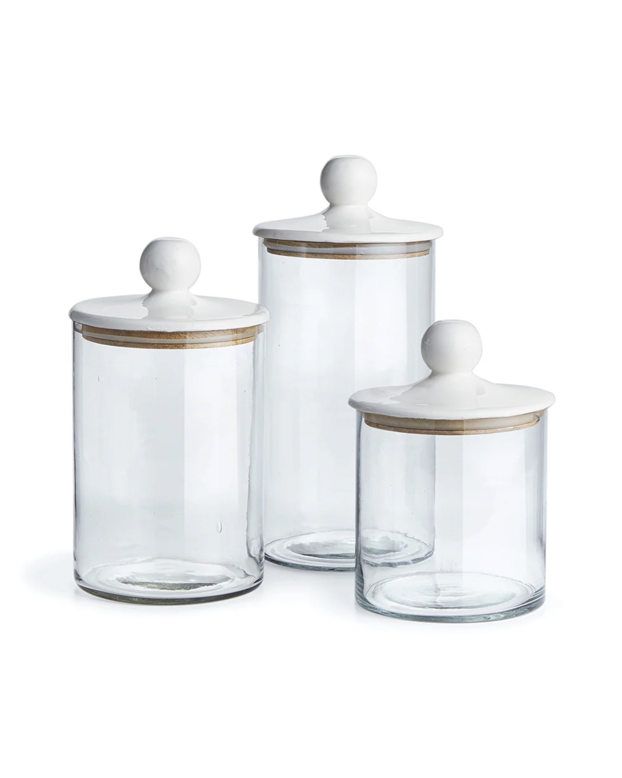 The EP206 Petaluma Canister set by Napa Home & Garden features three clear glass canisters in small, medium, and large sizes with white lids, each finished with a gold band and round knob for an elegant, decorative look.