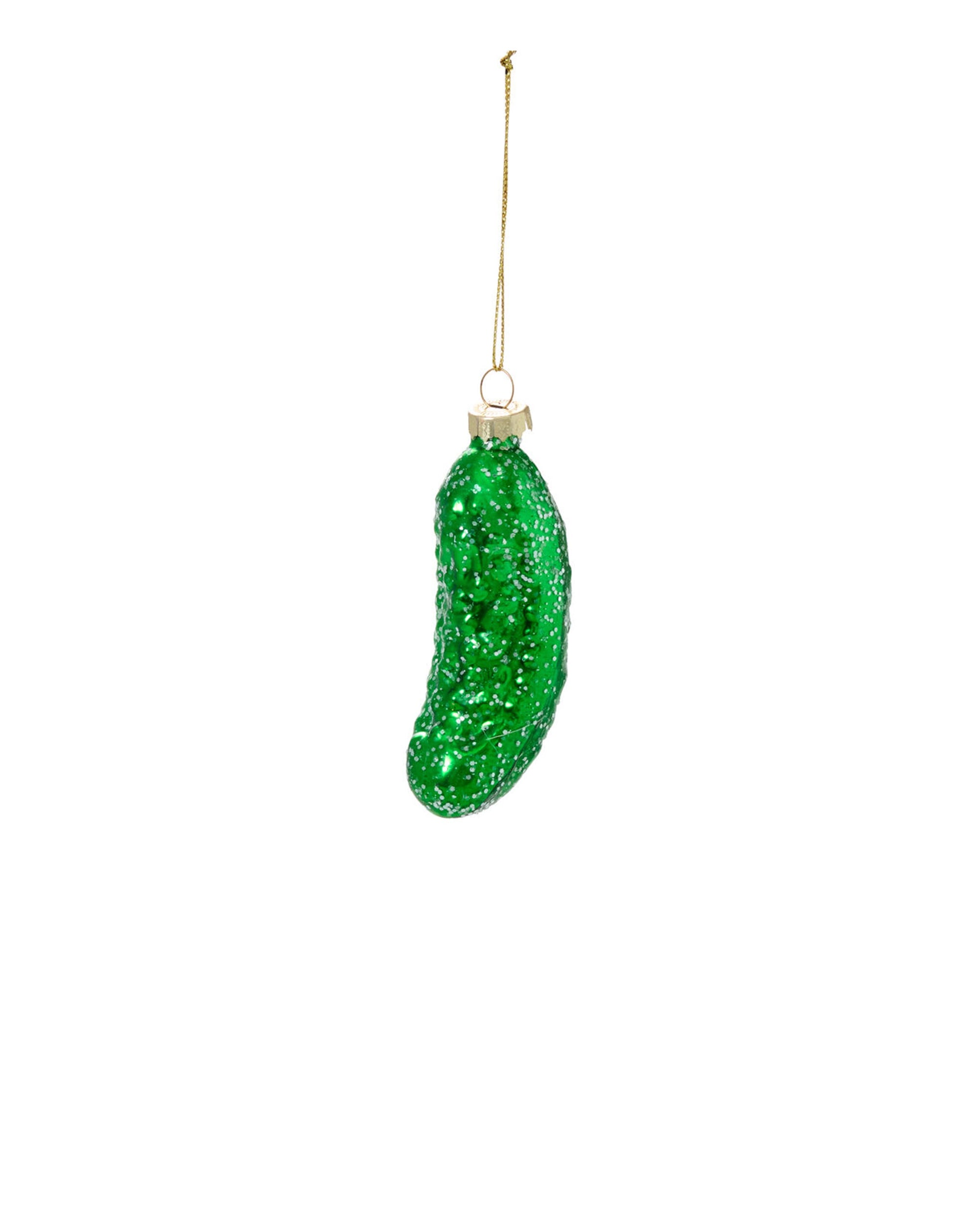 The Accent Decor Pickle Ornament is a glittery green, hand-painted glass ornament hanging from a thin gold string against a plain white background.