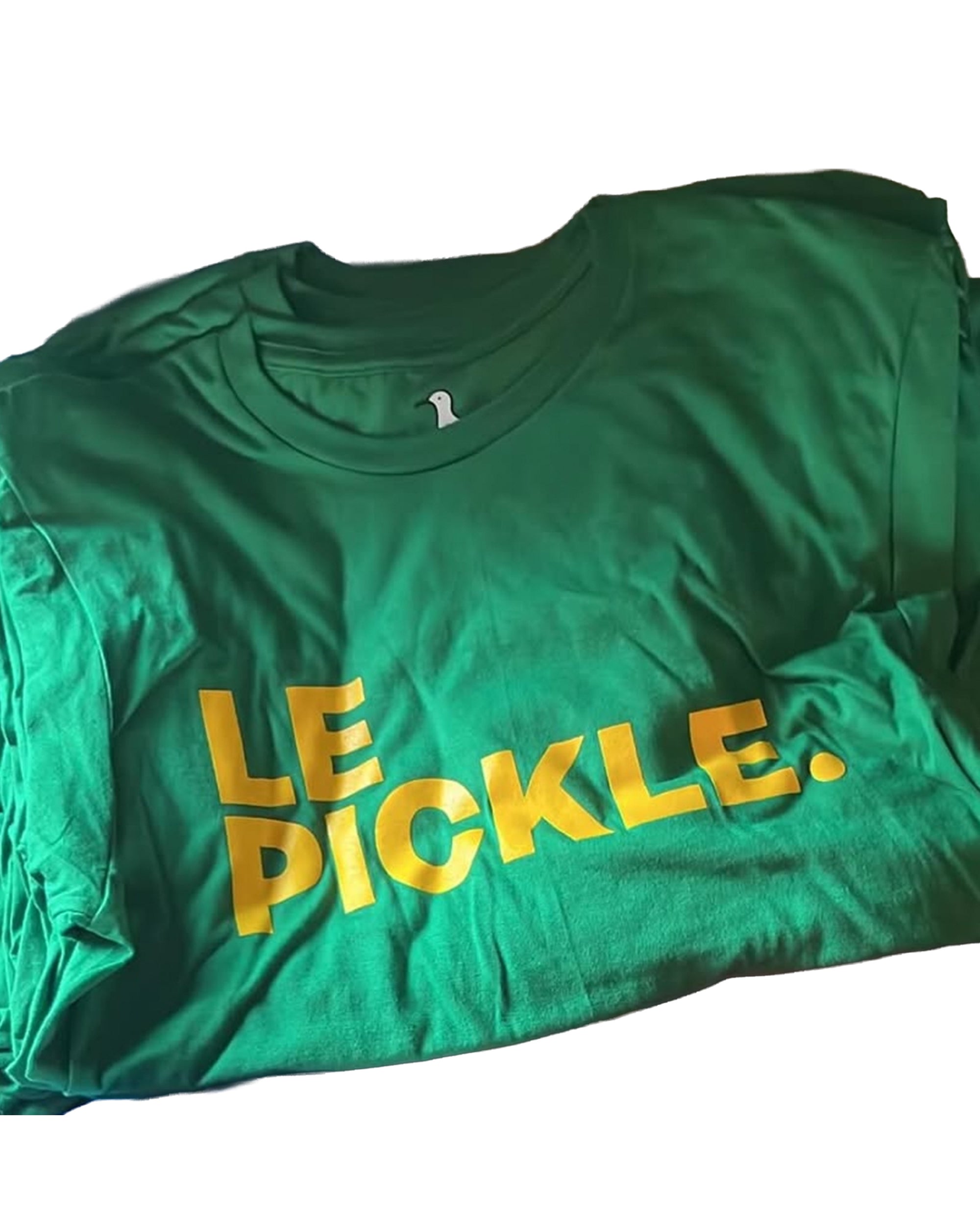 The Le Pickle Tee by Ping Pong Surf Club features bold yellow "LE PICKLE." text across the front—a perfect pick for fans of Le Pickle or laid-back surf vibes.