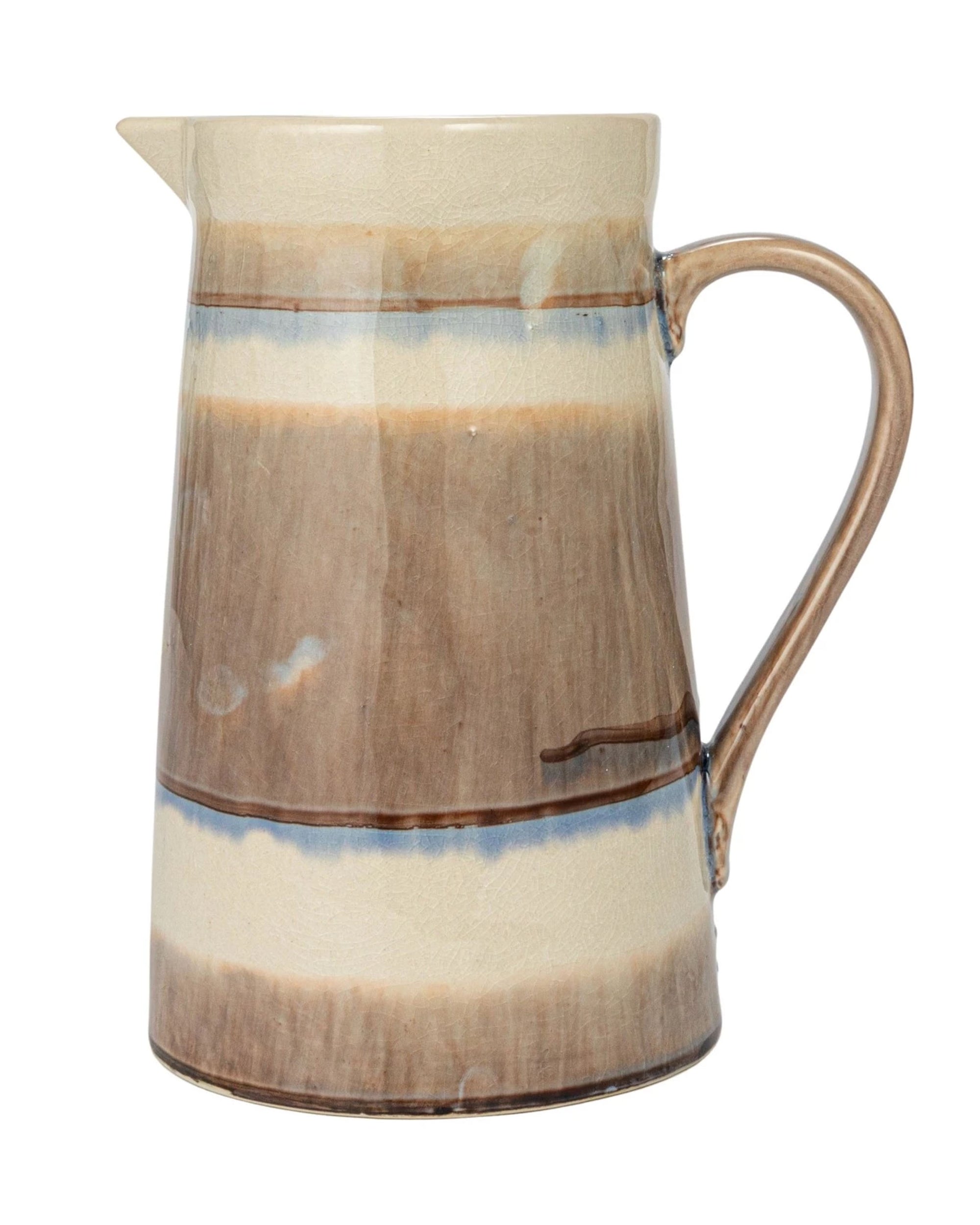 The Creative Co-op Pitcher w/ Stripes features brown and cream stoneware, a narrow spout, curved handle, blue accent stripes, and a charming crackle glaze for rustic serveware appeal.