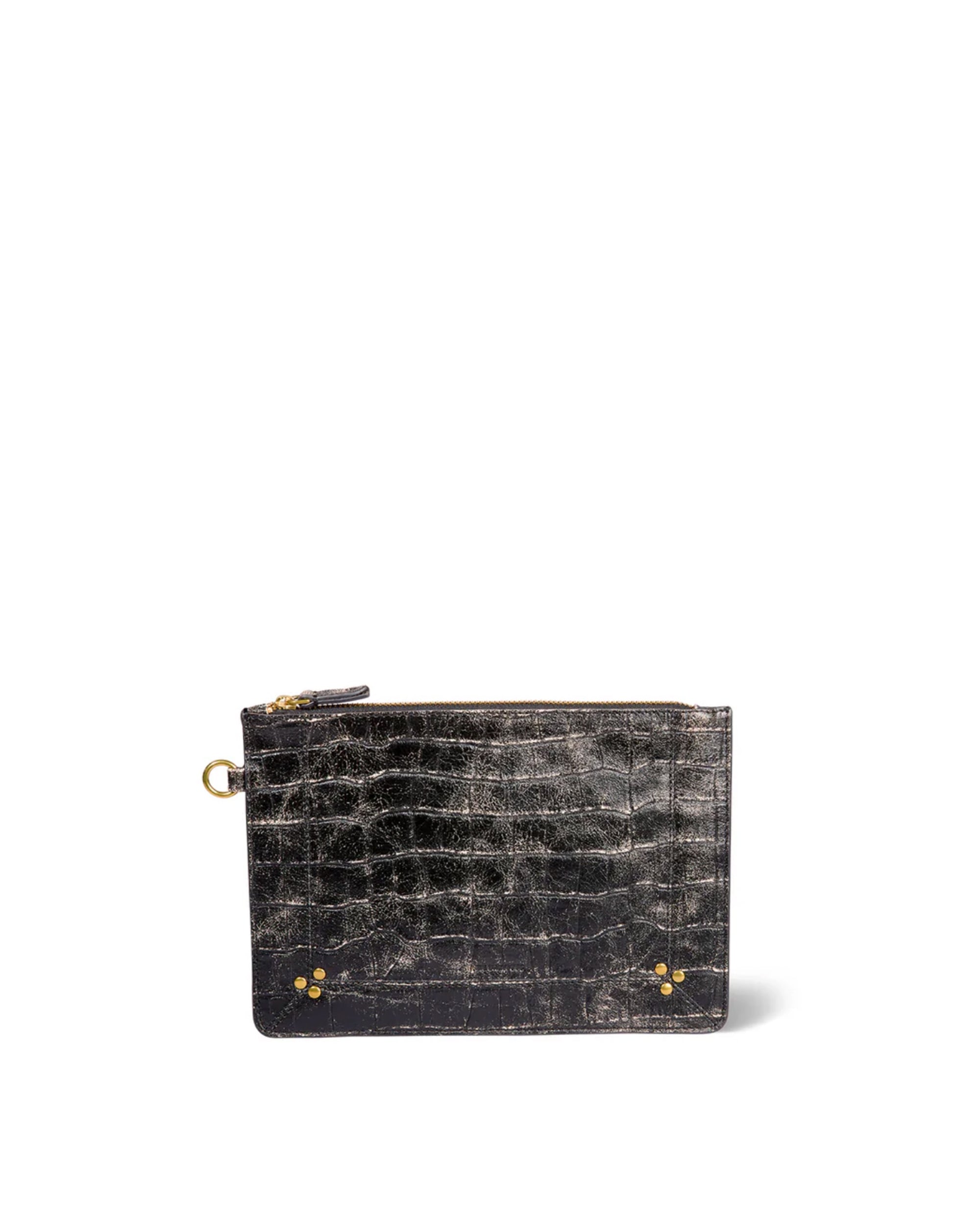 The Popoche M Pouche by Jerome Dreyfuss is a small, rectangular black leather pouch with crocodile texture, zip closure, gold ring key fob on one side, and gold studs at the bottom corners, shown against a white background.