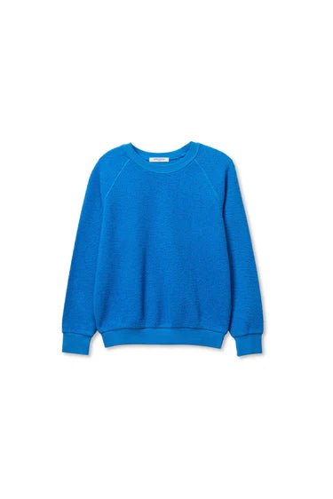 The Ziggy Reverse LS Sweatshirt by Perfectwhitetee features long sleeves, bright blue cotton fleece, and ribbed cuffs and hem, shown on a plain white background.