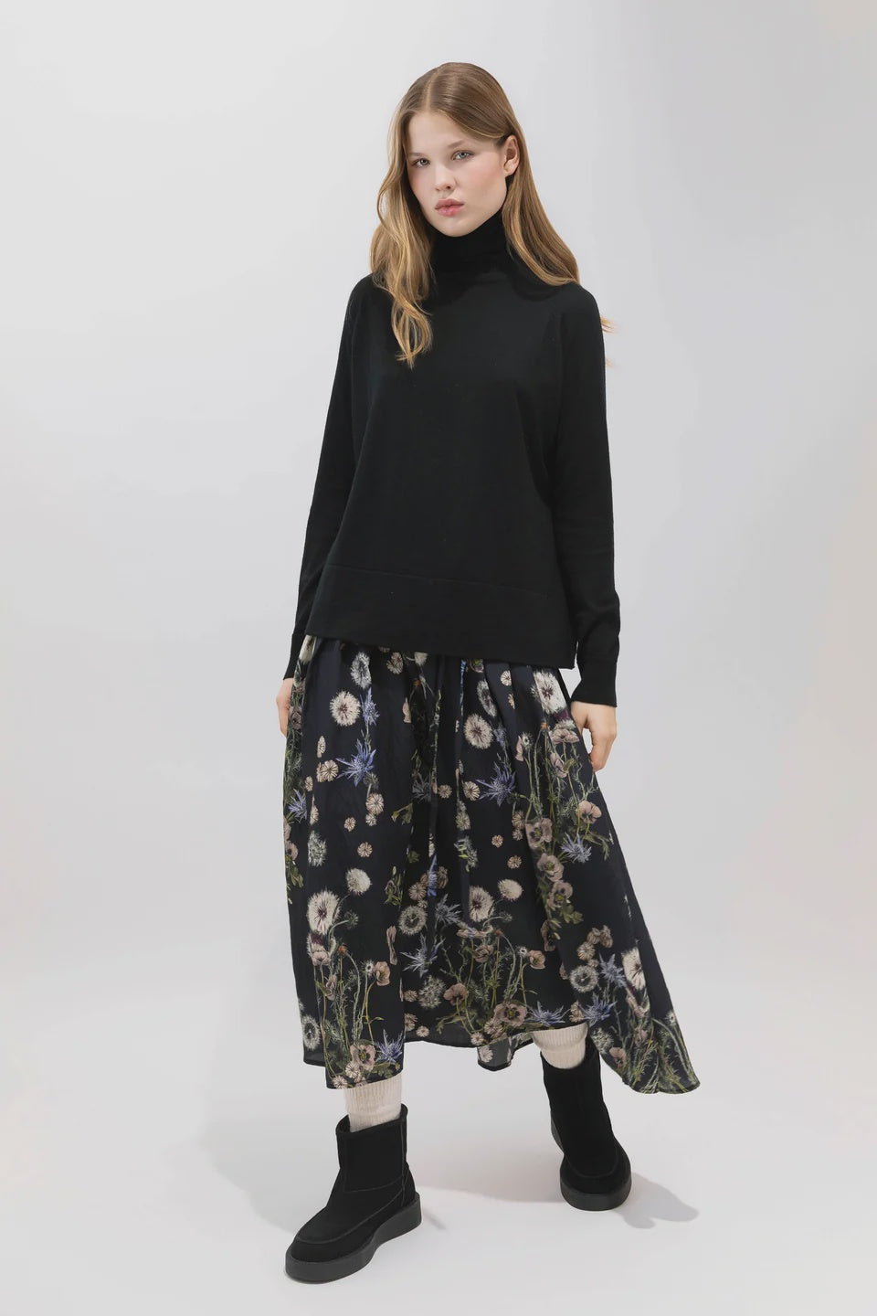 Psophia 2894 silk-blend floral skirt with waistband, styled with a black turtleneck and boots for a chic look.