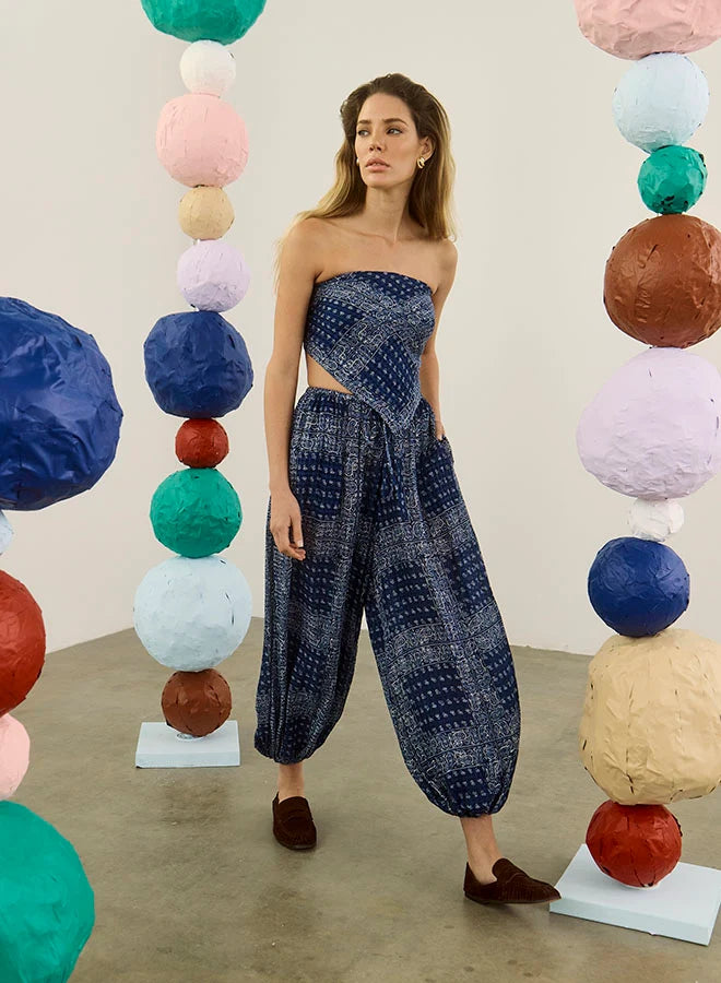 Hunter Bell NYC Briggs Pant in a bright gallery, styled playfully among colorful paper mâché spheres for a lively look.
