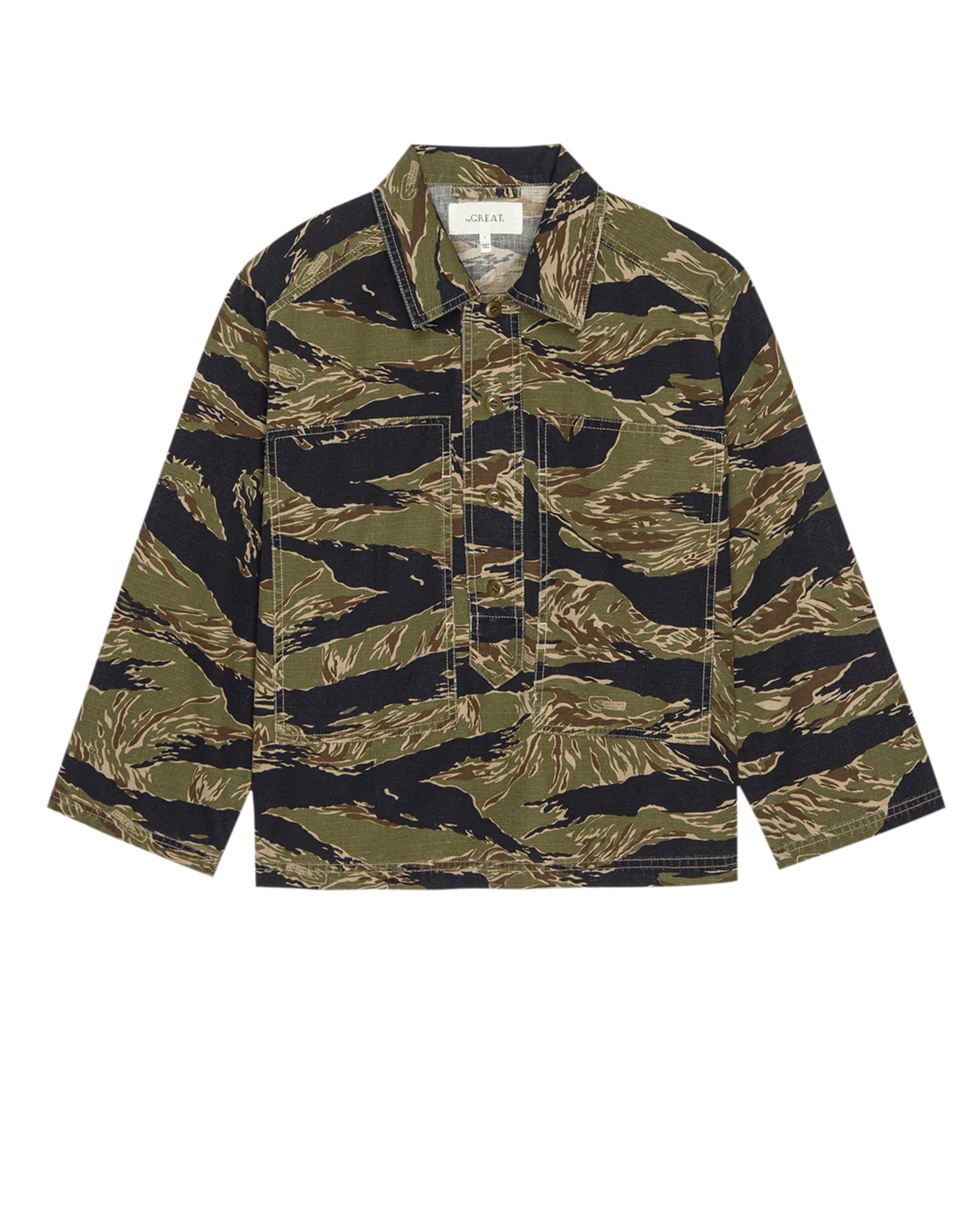 The Great Inc. Railway Shirt is a long-sleeved, collared shirt with a green, brown, and black tiger stripe camo inspired by vintage workwear, featuring a front placket and relaxed fit.