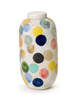 The OMT180 Colorful Circle Dot Vase by Two's Company is a tall, white, hand-painted lidded vase featuring textured polka dots in blue, yellow, green, pink, black, and beige—making it a unique decorative accent.