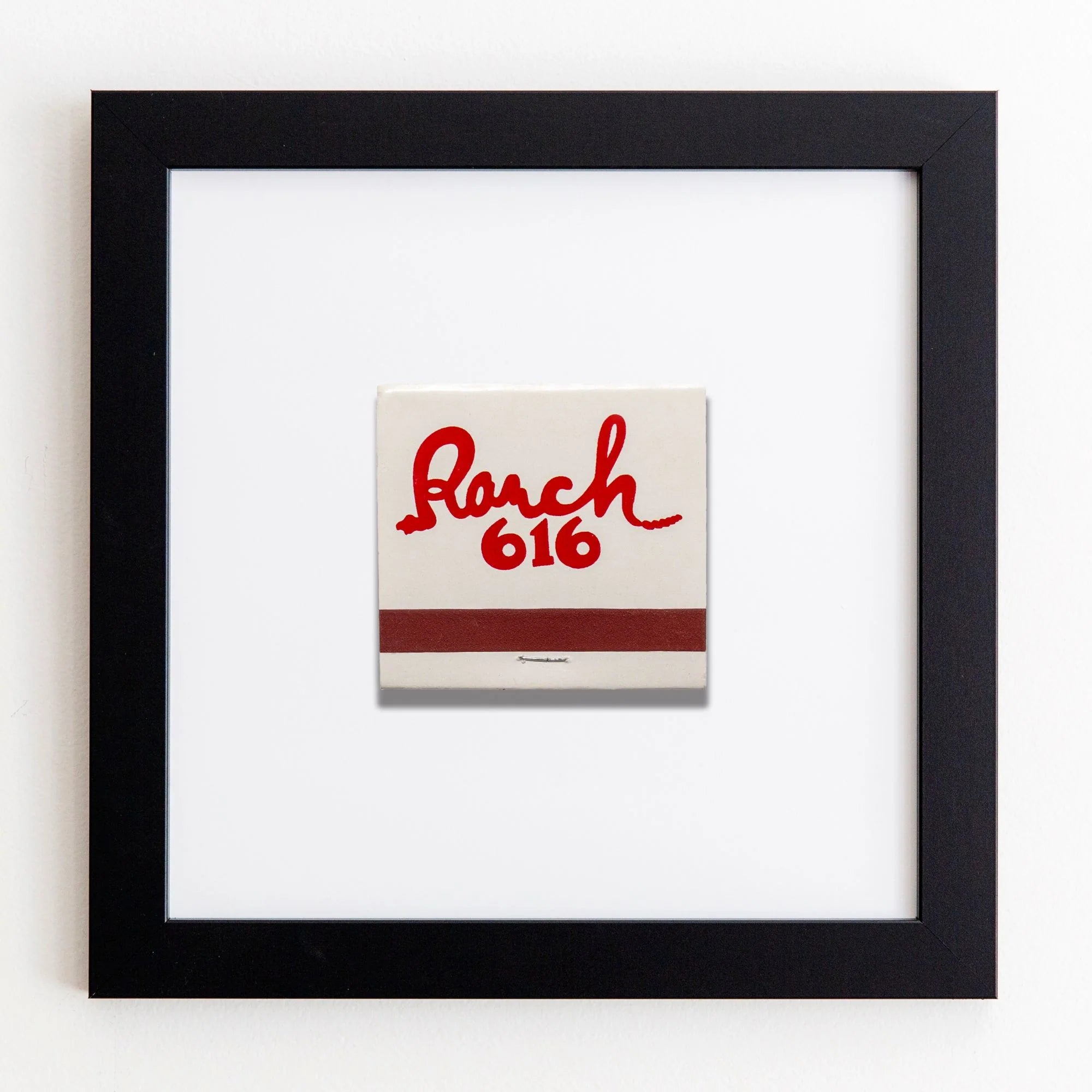 A square ceramic tile with &quot;Roach 616&quot; handwritten in red, framed in a Match South Art Square Black Frame against a white background.