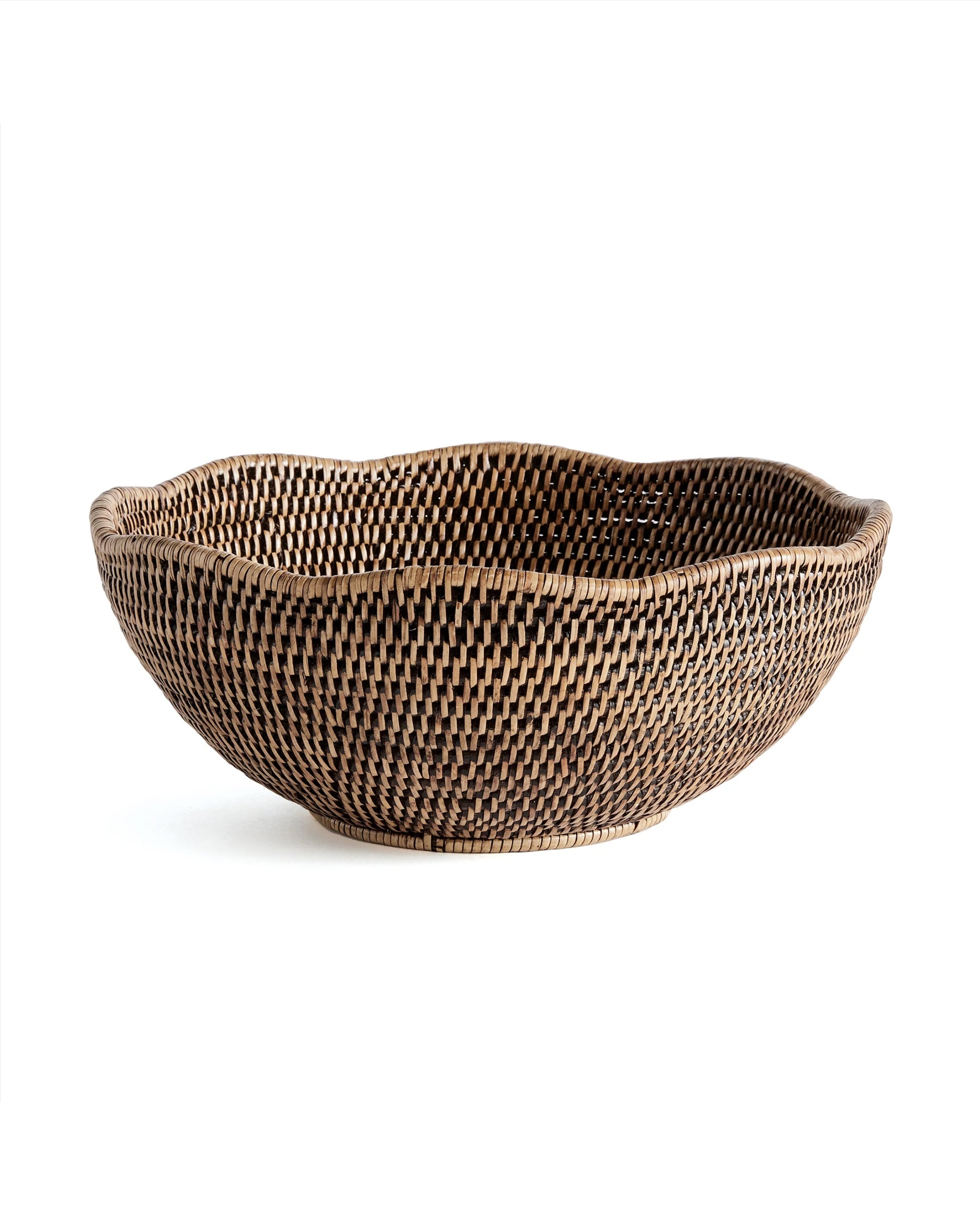The Burma Rattan Scalloped Bowl by Napa Home & Garden is a large, shallow woven basket with a scalloped edge and checkered natural and dark brown pattern, displaying fine craftsmanship on a white background.