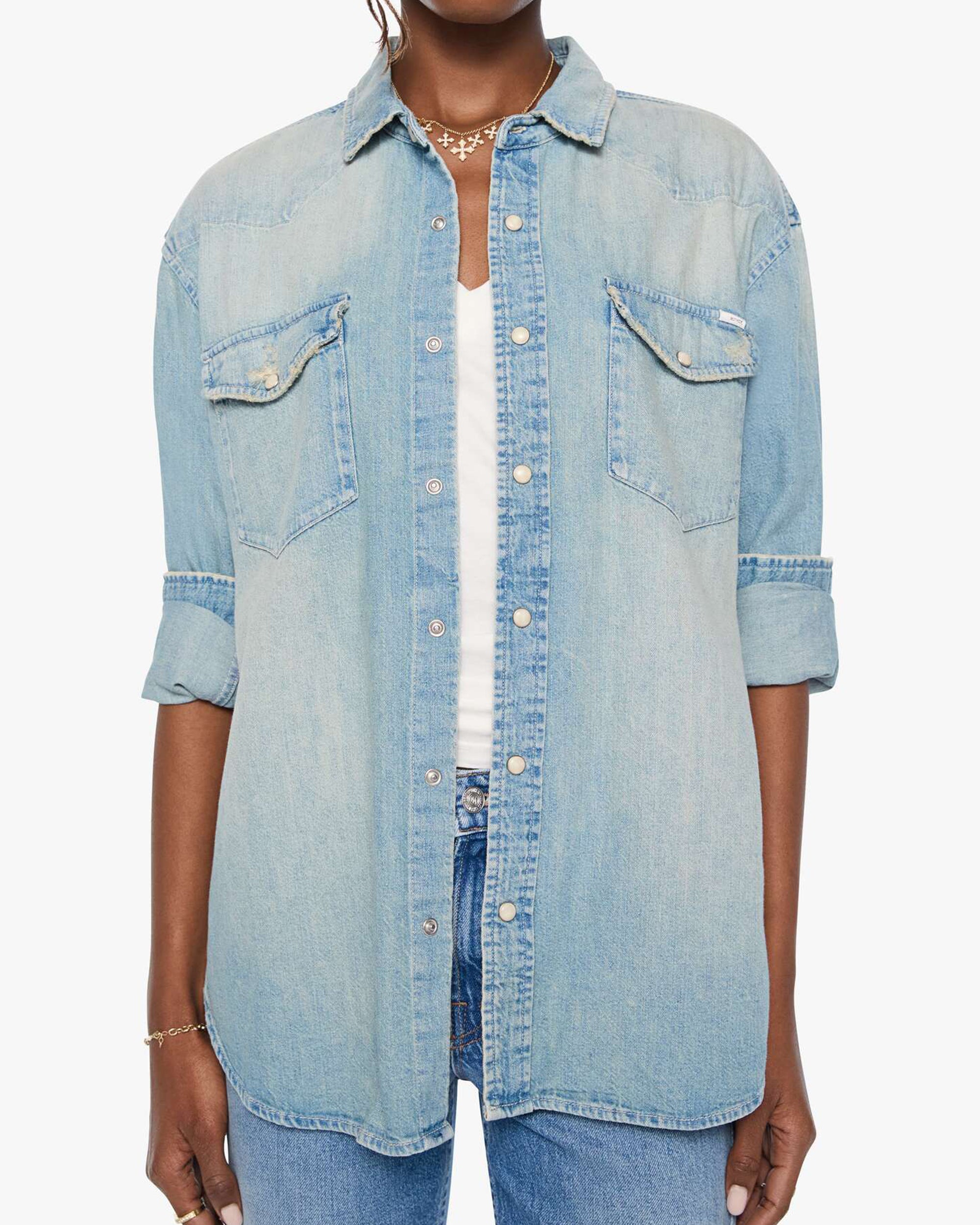 The Exes And The Ohs jacket by Mother in Rowdy Roadshow, styled casually over a white top and blue jeans.