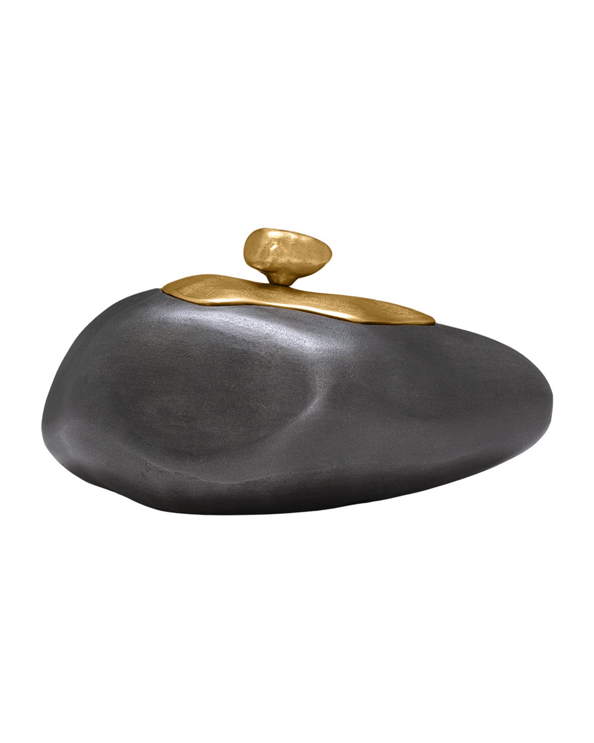 The Import Collection’s Finkle Large Box is a decorative piece resembling a smooth, dark gray stone crafted from aluminum, topped with a gold pebble-shaped accent and set against a white background.