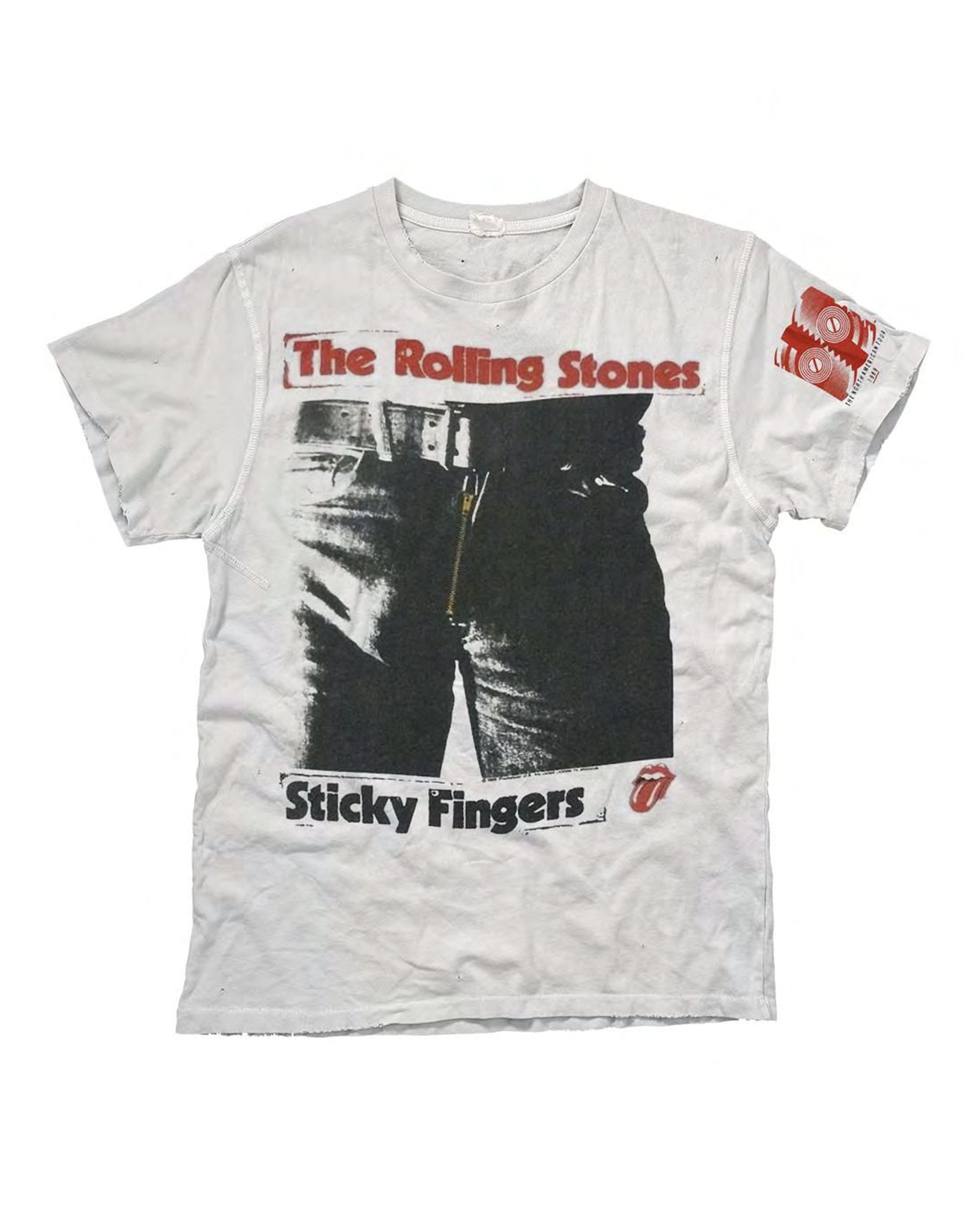The Made Worn Rolling Stones Crew Tee is a white shirt with the "Sticky Fingers" album cover, bold red band text and logos on the front and sleeve—a classic style for rock fans.