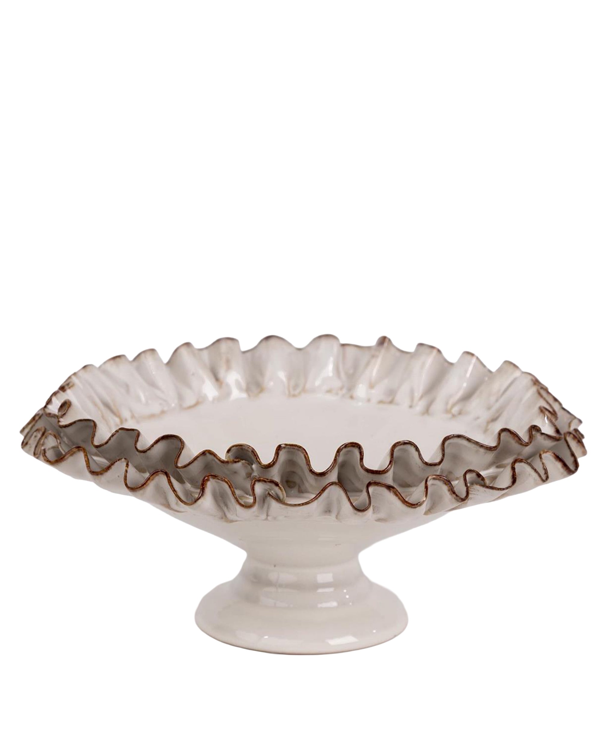 Handcrafted by Faire, the Compote with Ruffles is a white ceramic pedestal cake stand featuring a fluted, ruffled edge with light brown trim, reminiscent of classic compotes, shown against a plain background.