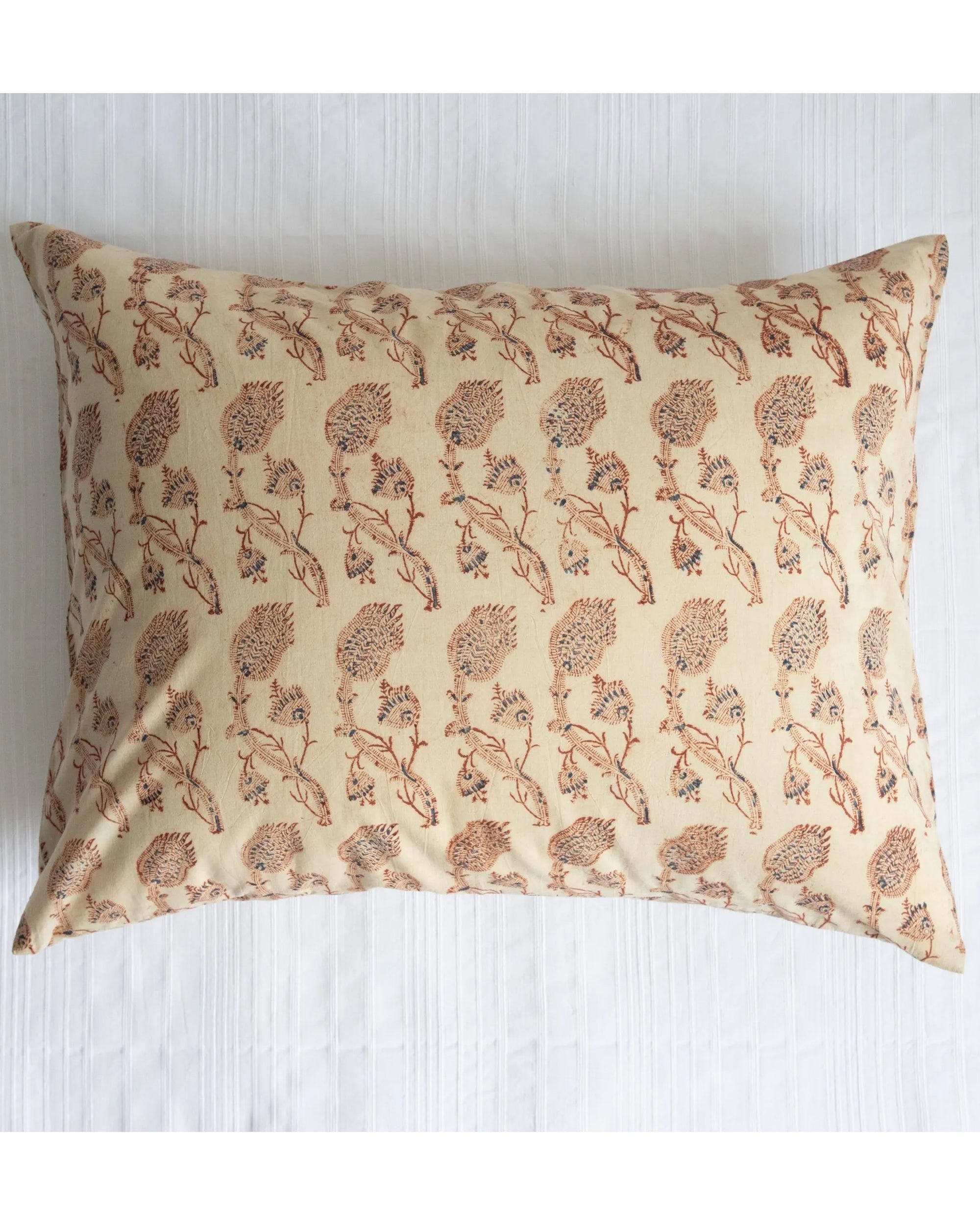 The Les Indiennes Rupa Tan Standard King Pillow Shaw features a beige pure cotton cover with brown floral patterns and is displayed on a white textured surface.