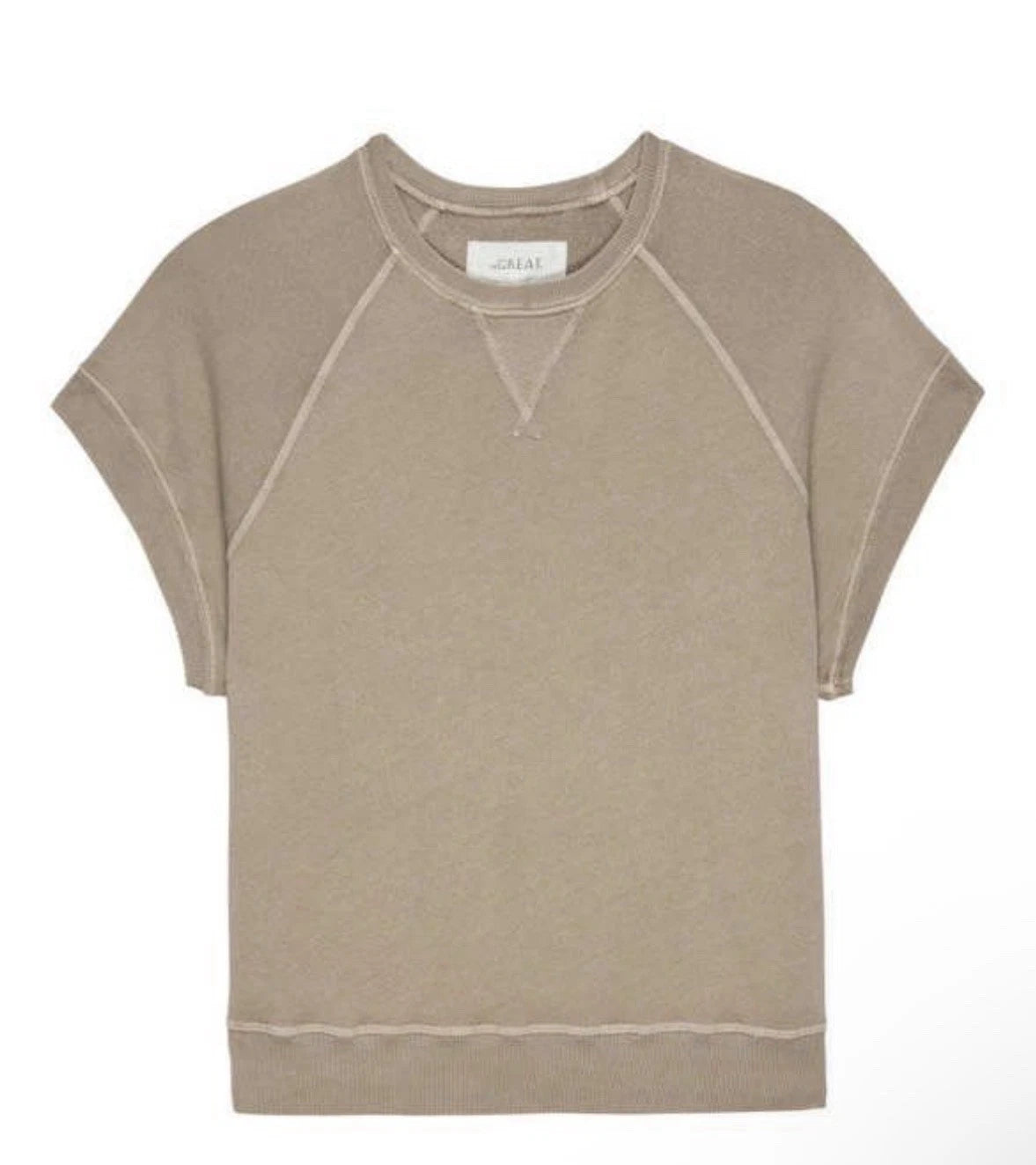The Great Inc. presents The Wedge Sweatshirt: a short-sleeved, light brown crew neck with visible seam details, laid flat on a white background for a vintage-inspired look.