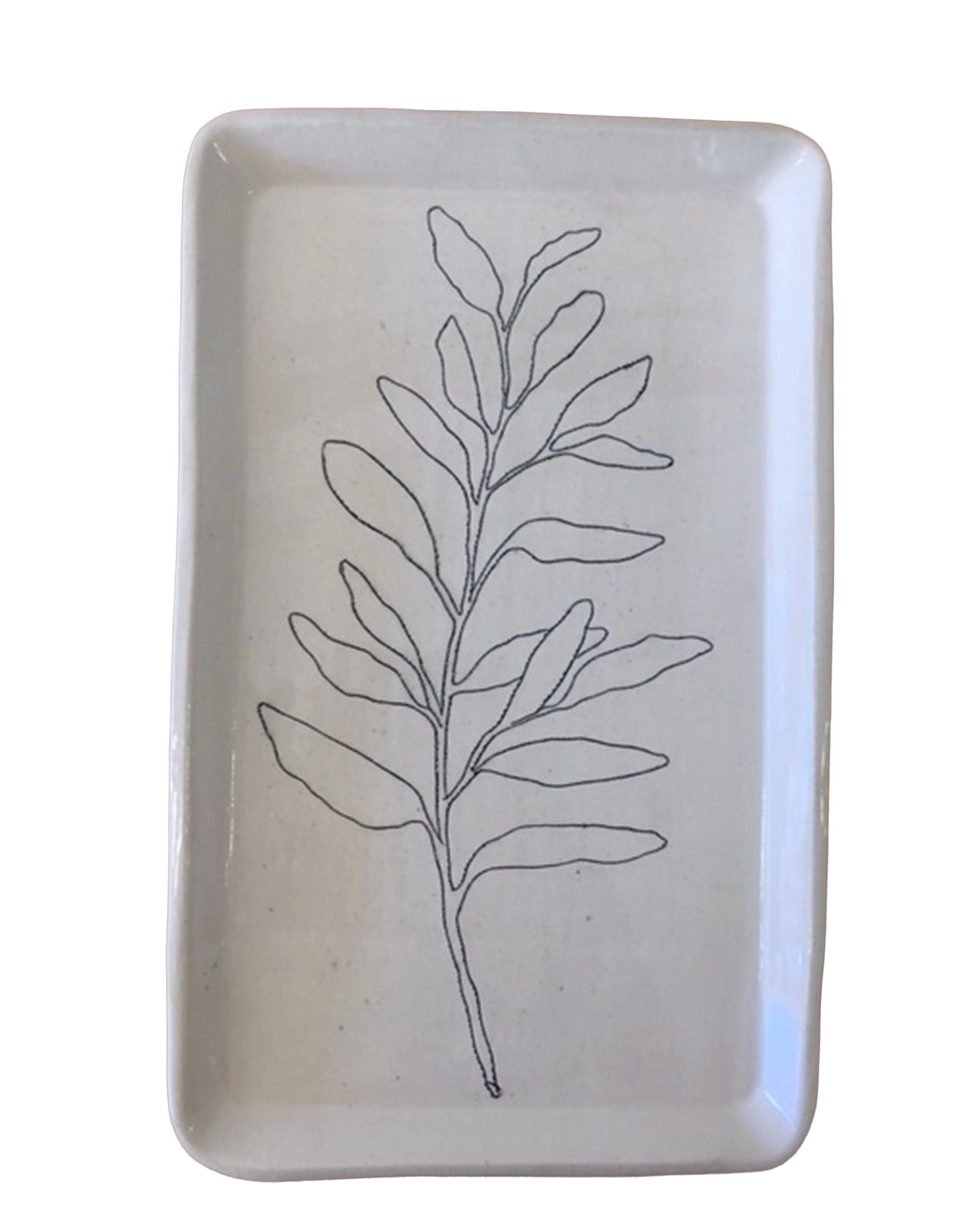 The CSF Tray by Faire is a rectangular white ceramic tray with a minimalist black line drawing of a leafy branch in the center, ideal for holding sage or lavender during spiritual cleansing rituals.