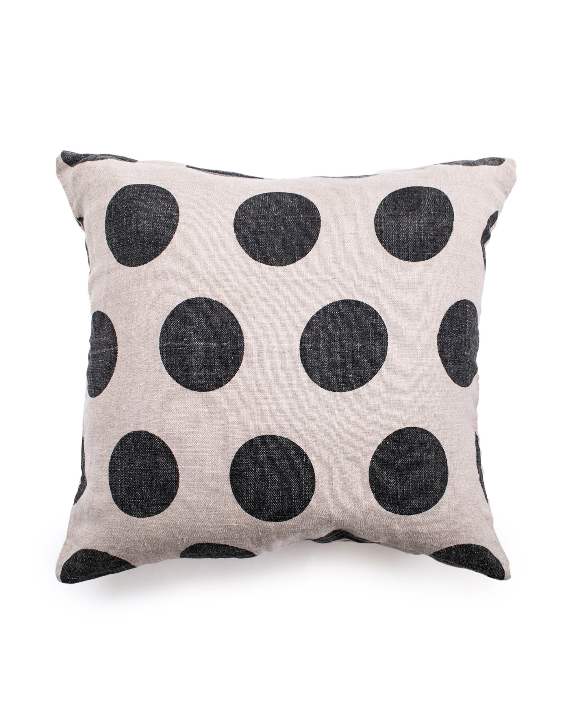 The Sugarboo Designs Reversible Polka Dot Pillow is a square beige throw pillow with large black polka dots, shown on a white background.