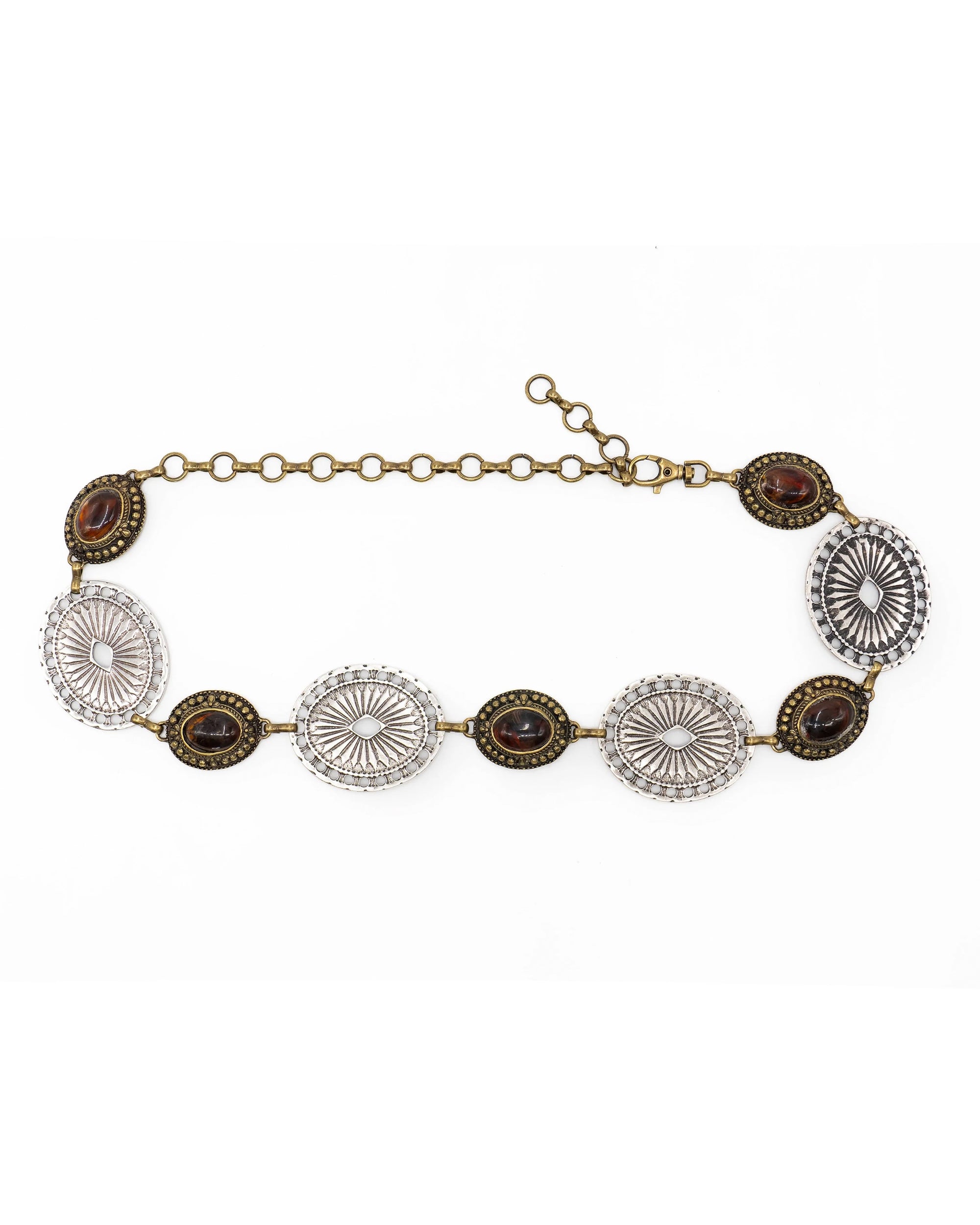 The Brass & Silver Concho belt by Streets Ahead Inc features alternating large silver and small brown oval medallions, linked by a bronze chain with an adjustable clasp—an eye-catching boho accessory for any outfit.
