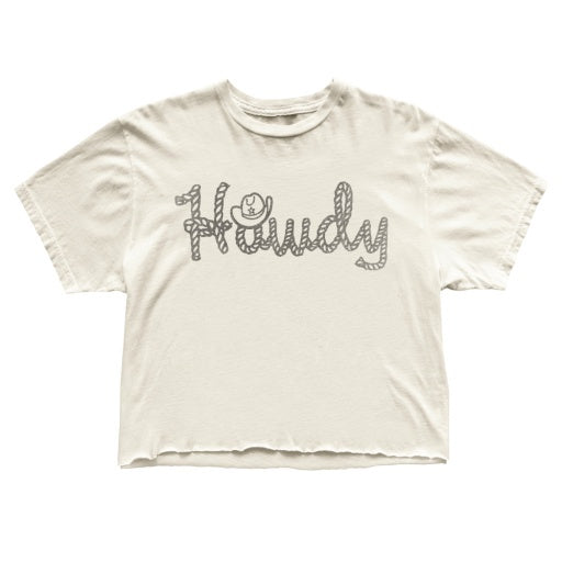 The HOWDY SHIRT from Wildcat Retro Brands is a white cut-off tee adorned with the word "Howdy" in a playful, patterned font and a smiley face integrated into the design, displayed flat against a plain background. Ideal for casual wear.