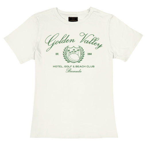 A white unisex T-shirt by Wildcat Retro Brands featuring "Golden Valley" written in green cursive text on the chest. Below, it reads "Estd. 1994", "Hotel, Golf & Beach Club", and "Bermuda", all in green text. A green emblem resembling a laurel wreath and golf course is also featured.