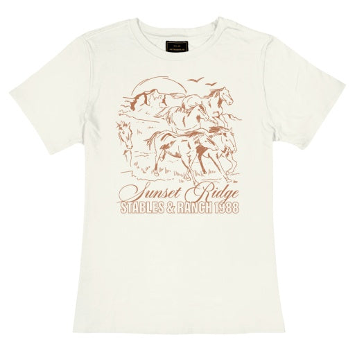 Product Description: The SUNSET RIDGE, a white baby tee from Wildcat Retro Brands, features an enchanting illustration of horses running through a field, complete with mountains and birds in the background. Below the artwork, the phrase "Sunset Ridge Stables & Ranch 1988" is printed in stylish brown lettering. This unisex piece is made from soft 40 singles fabric to ensure maximum comfort.