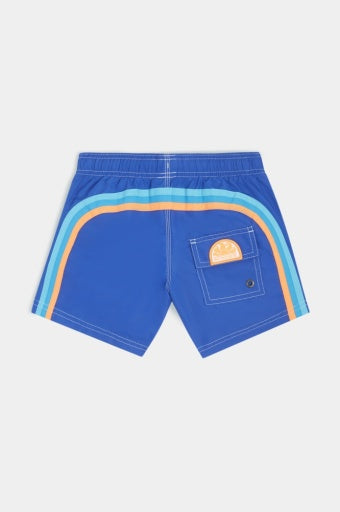 The ELASTIC WAIST Board Short by SUNDEK/KickoffUSA features vertical orange and blue side stripes, an elastic waistband, and a back pocket with an orange graphic patch.