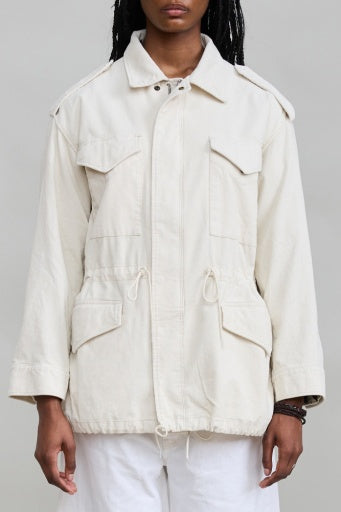 Light beige Denimist Utility Field Jacket with pockets and drawstrings, shown on model against plain backdrop.