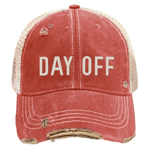 Introducing the DAY OFF HAT by Wildcat Retro Brands: a vintage red baseball cap featuring distressed frayed edges and a beige mesh back. The front showcases "DAY OFF" in bold white capital letters, embodying the classic snap-back style.