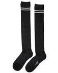 The Unified Shimmer Socks are long, ribbed black knee-highs featuring two white stripes near the top and subtle white text by the toe on one sock.