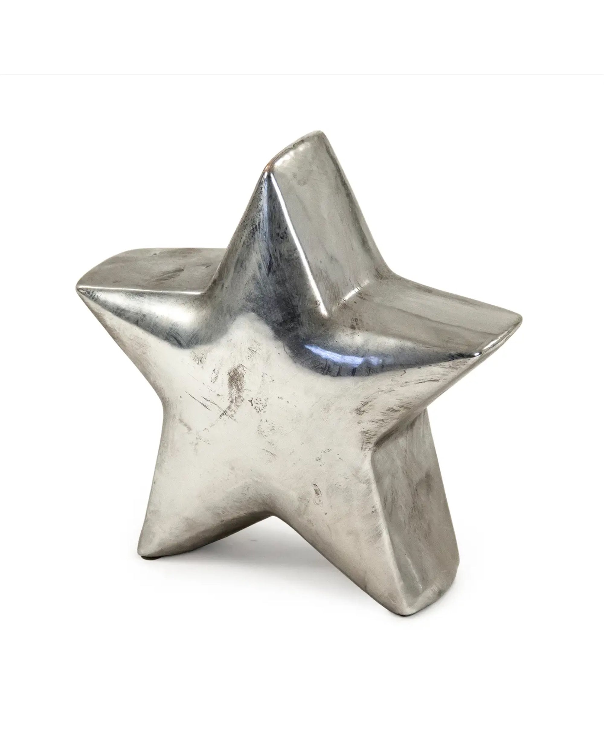 The Zentique Distressed Metallic Star features a smooth, reflective surface and stands upright on a white background—an ideal accent piece to elevate your home decor.