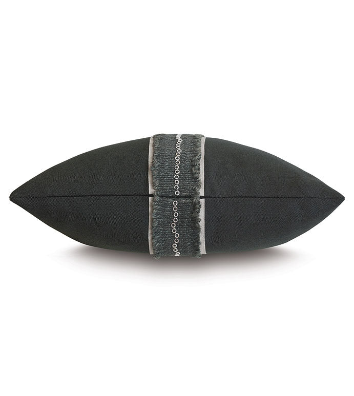 The Eastern Accents Modesta Grommet Border pillow showcases a rectangular black design with a central gray strip, shiny sequins, and elegant border trim, displayed against a white background.