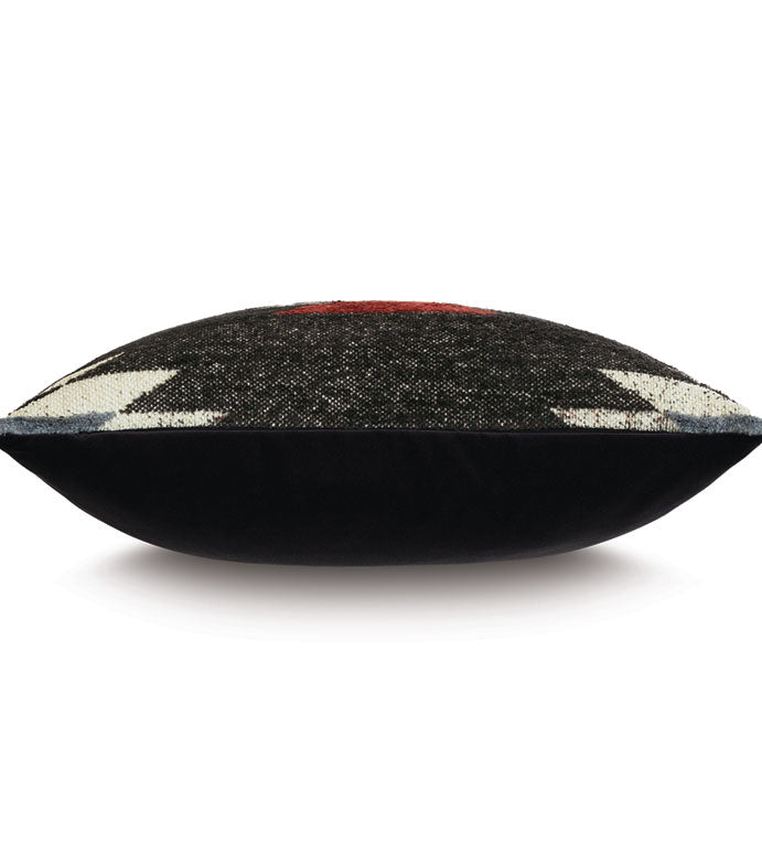 The Fortnum Kilim 22x22 decorative pillow by Eastern Accents features a black velvet base, a textured top with white and red tribal geometric patterns, and is shown from the side against a white background.