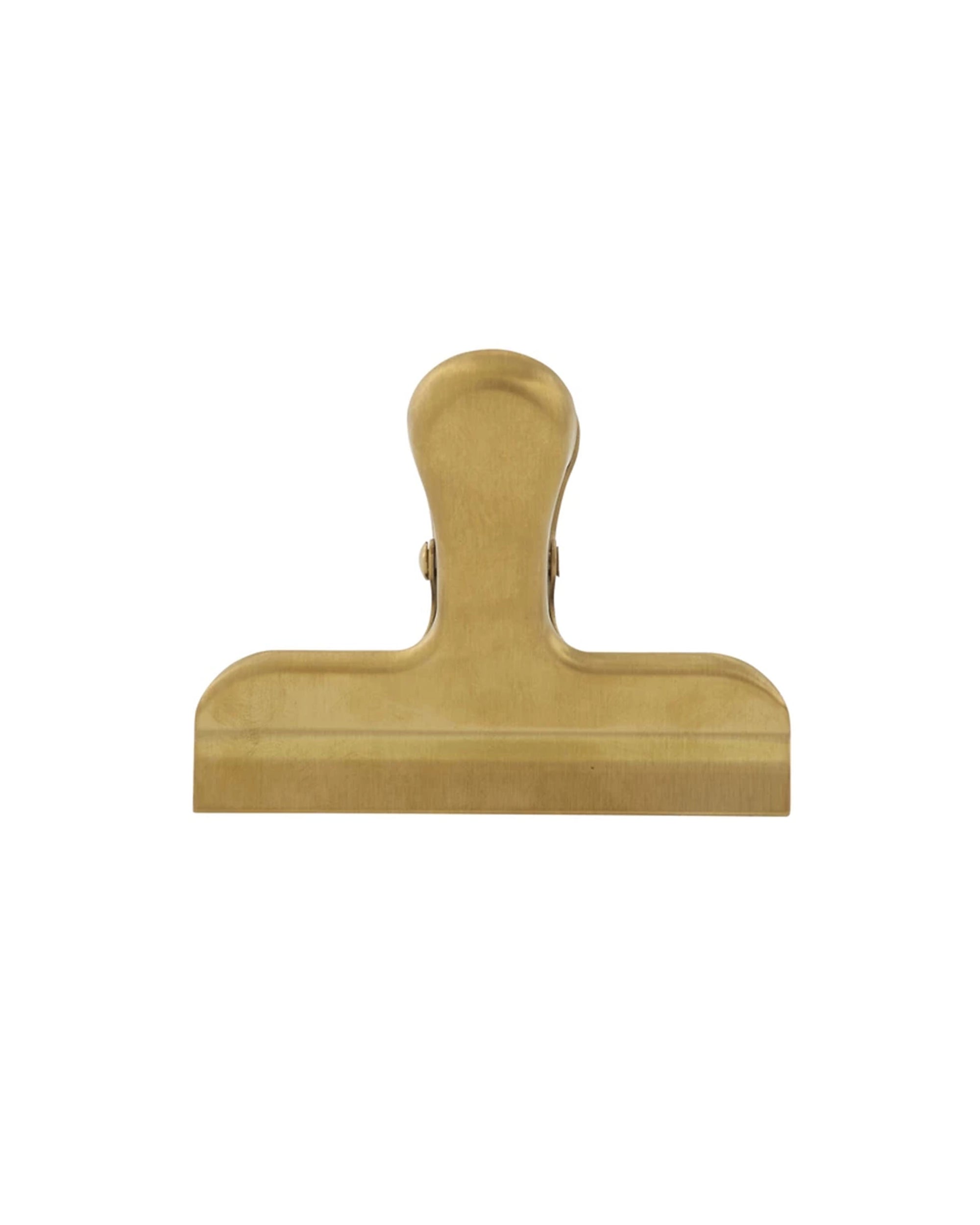 A stylish office essential, the Bloomingville Stainless Steel Document Clip has a wide, flat grip and rounded handle, shown isolated on a white background.