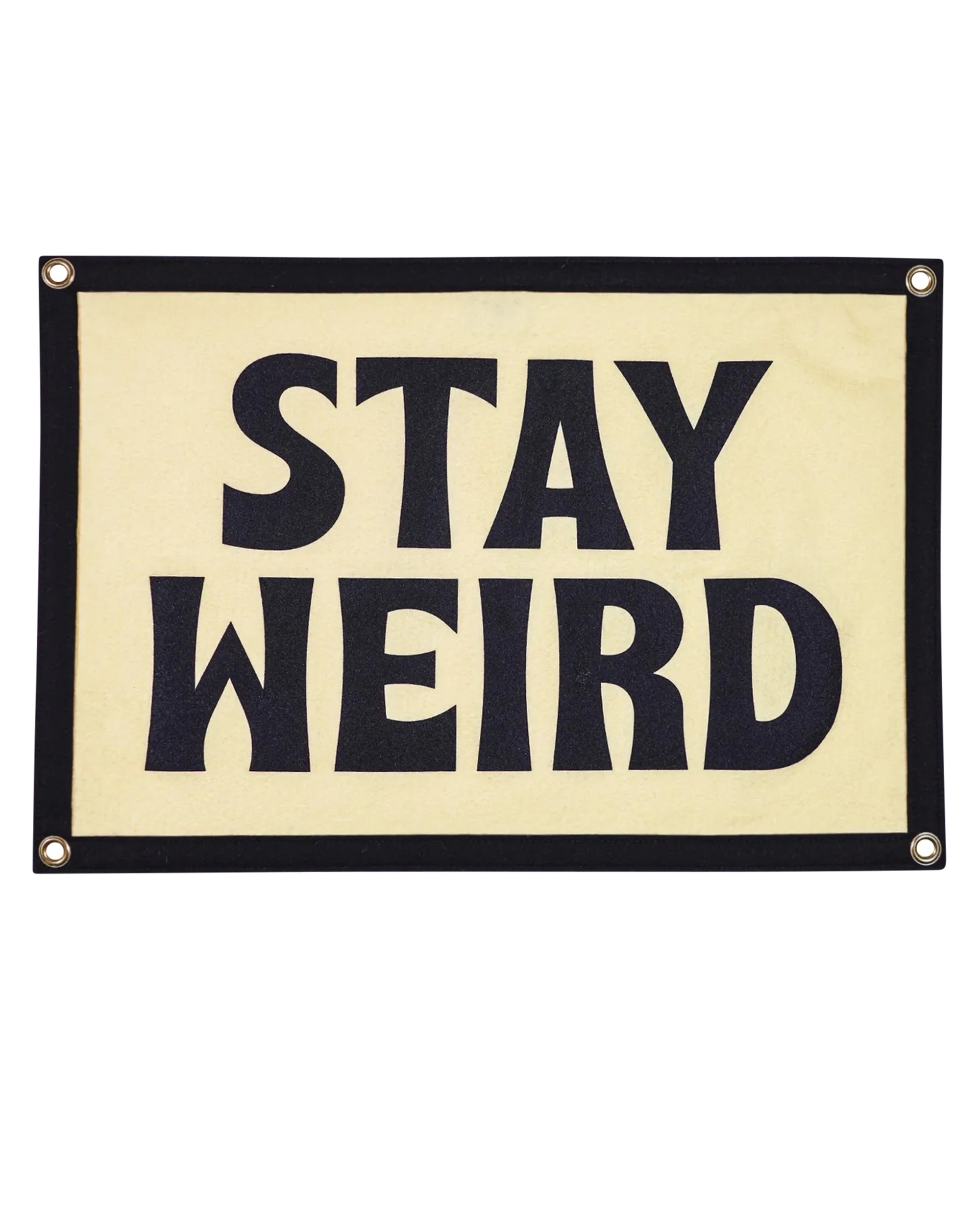 The Oxford Pennant Stay Weird Camp Flag 16x24 features bold black "STAY WEIRD" text on a cream background with a black border and metal grommets, making it perfect wall decor to energize any space.