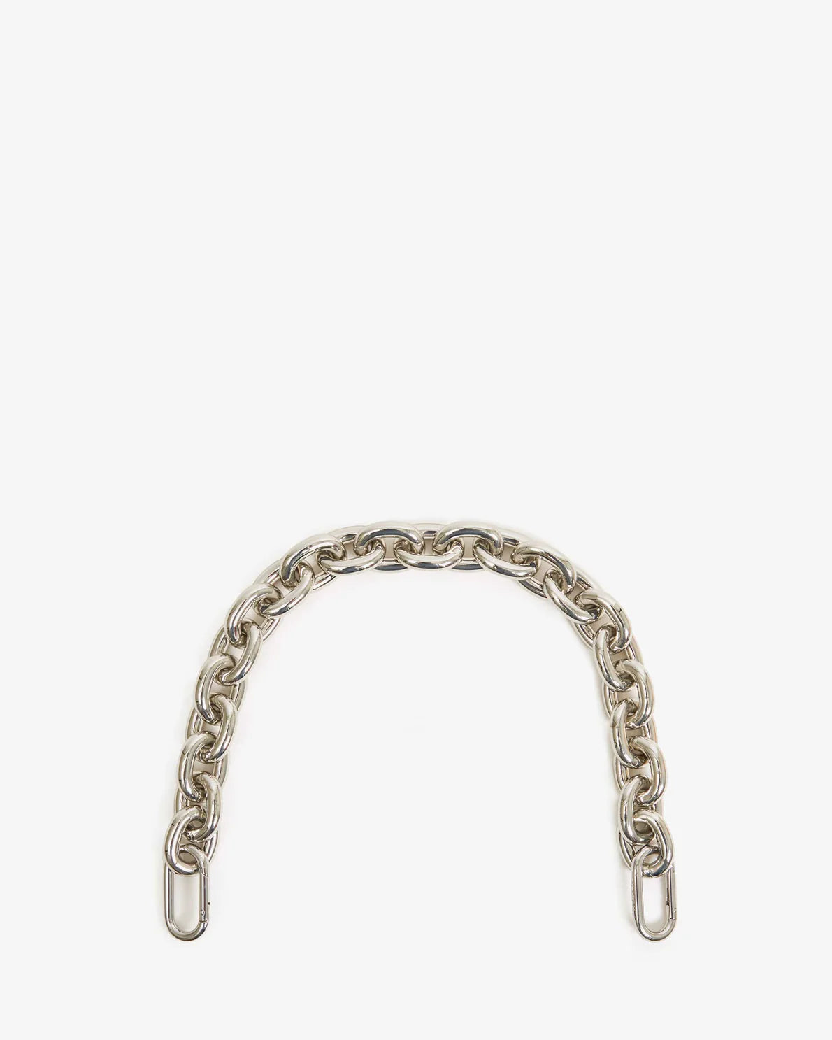 A Clare Vivier Shortie Strap with large, oval-shaped links, 17" long, arranged in a semi-circle against a plain white background. Both ends of the chain are equipped with larger brass spring links for attachment.