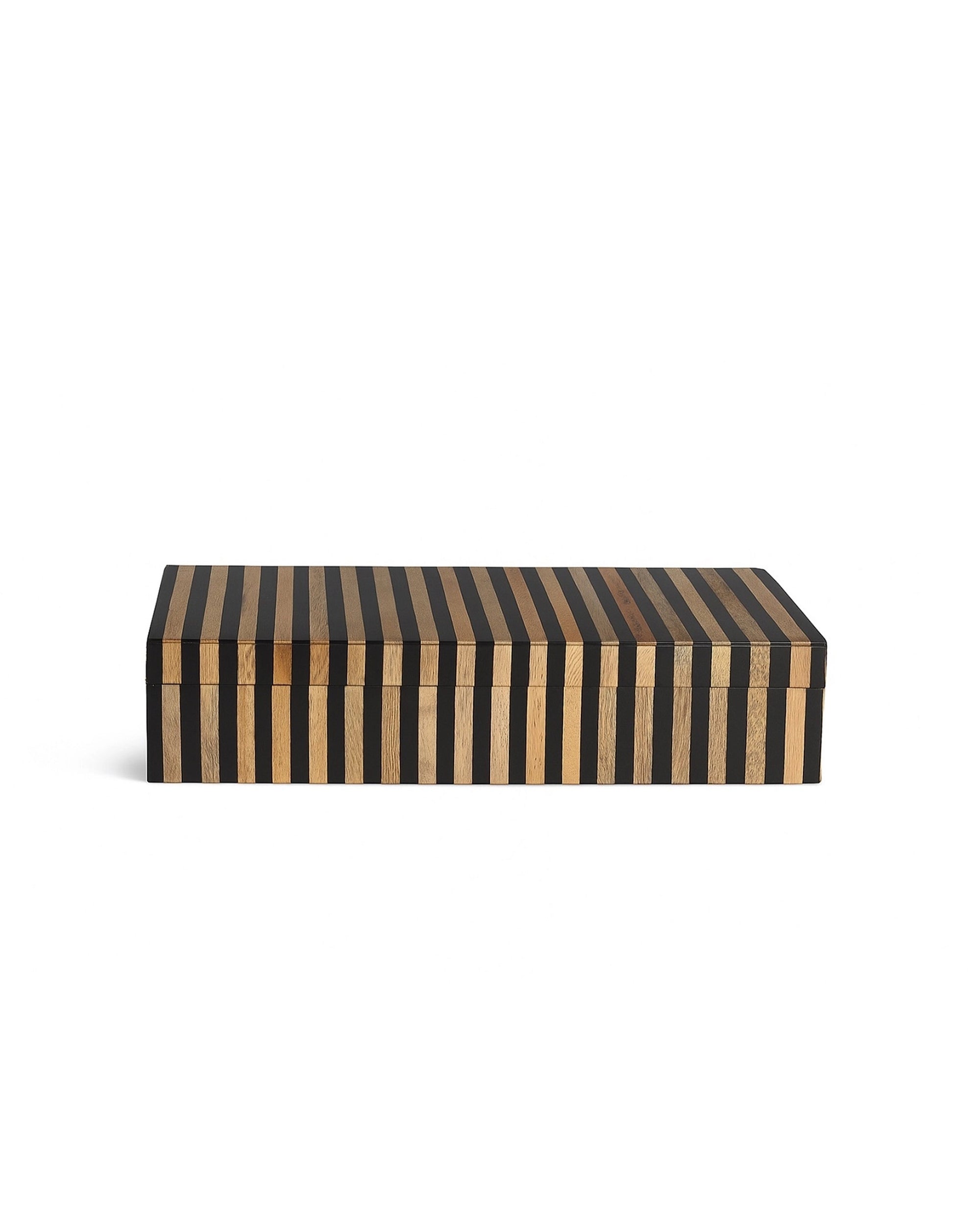 Wood and black resin box with bold vertical stripes by Faire, striking accent piece for modern interiors.